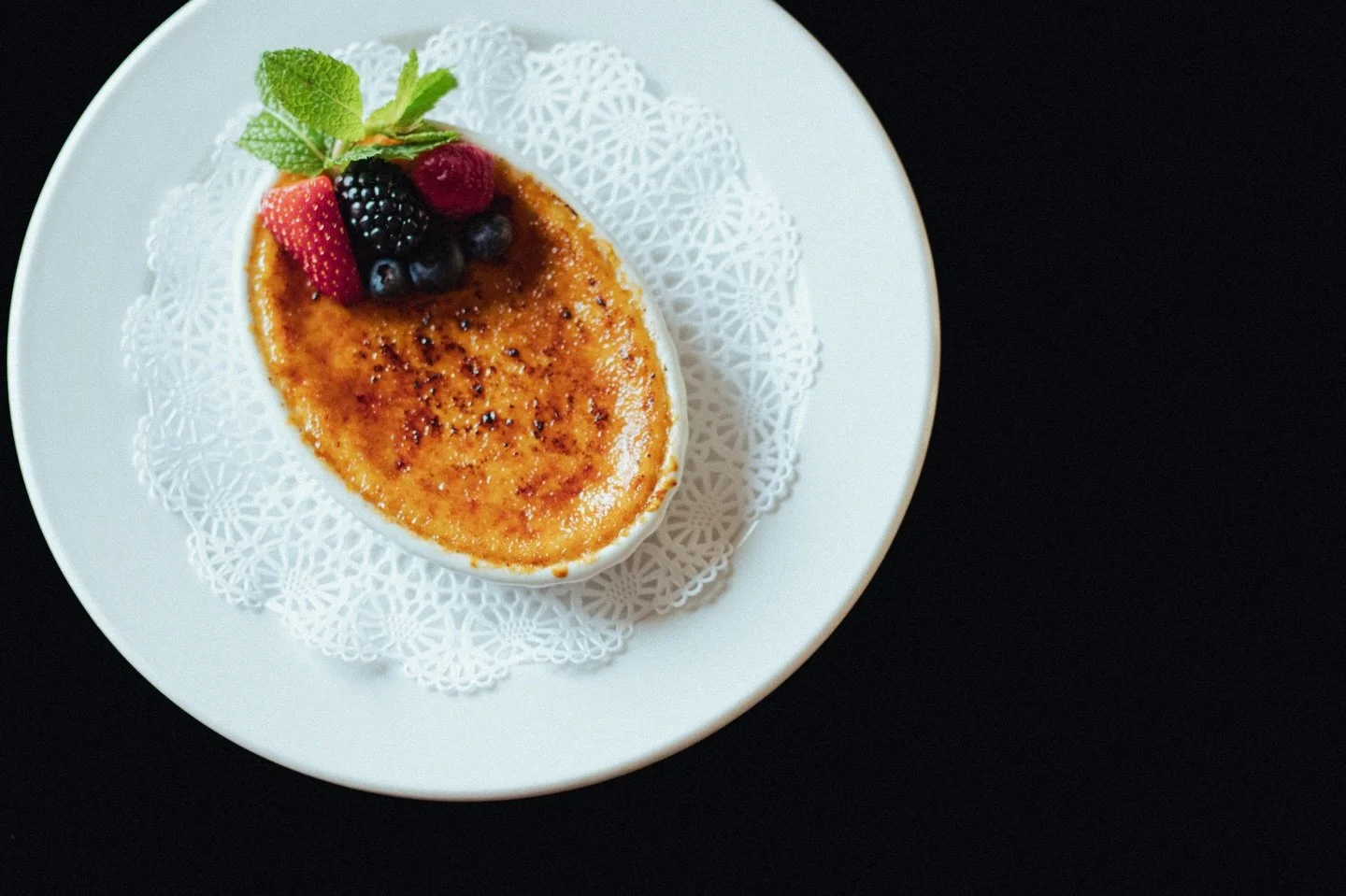 A moment of indulgence, finished to perfection ✨

At BiCE Ristorante, our cr&egrave;me br&ucirc;l&eacute;e is a timeless classic delicately torched to a golden crisp, revealing a silky, velvety custard beneath.
Topped with fresh berries and a touch o
