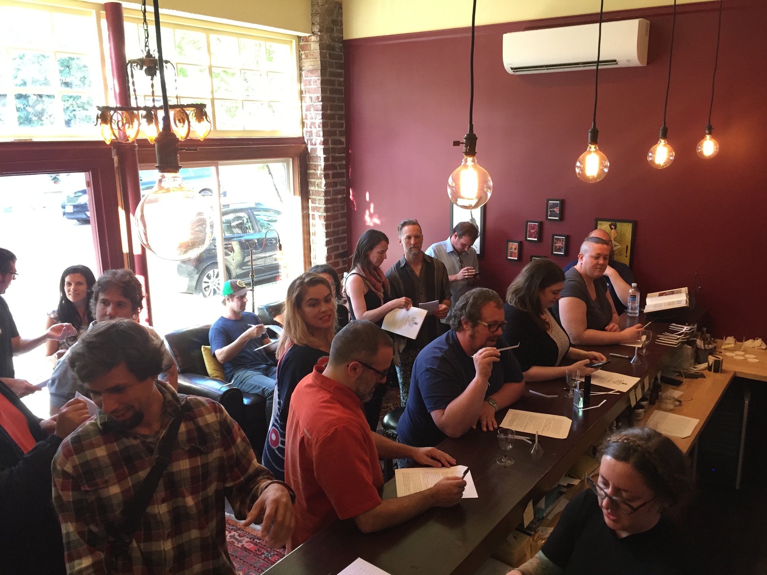 The attendees sample the various raw materials and record their impressions.