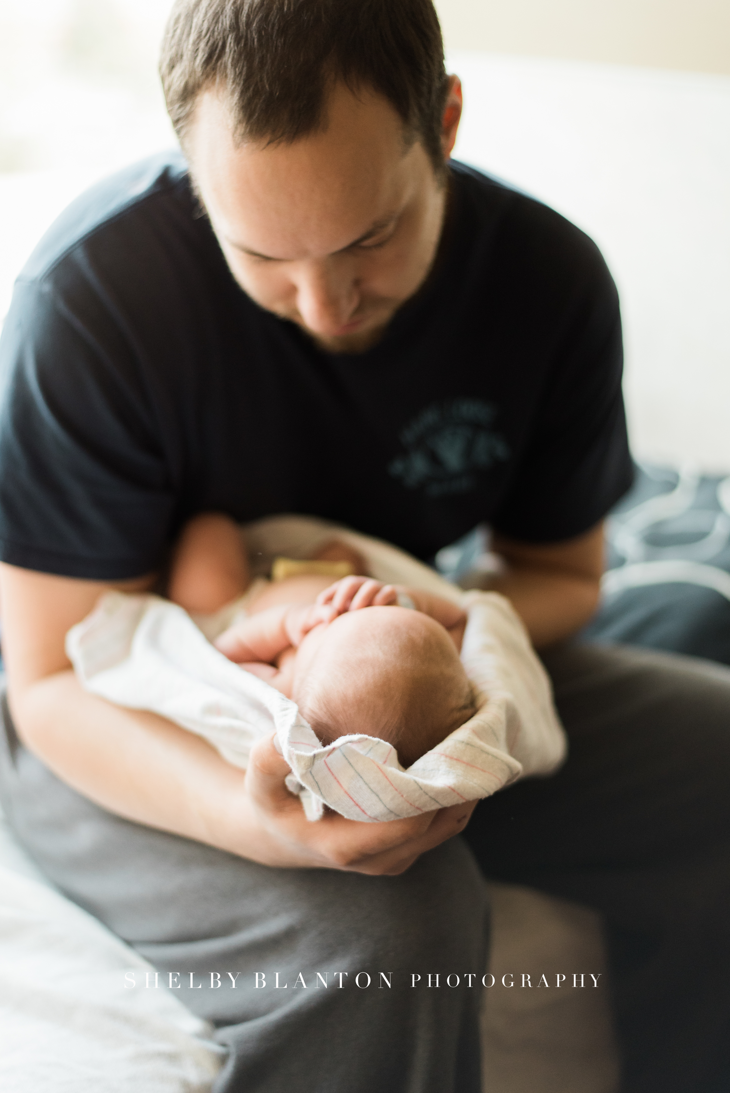 Salem, Oregon Newborn Hospital Photographer | Dad holding newborn for Fresh 48 Session