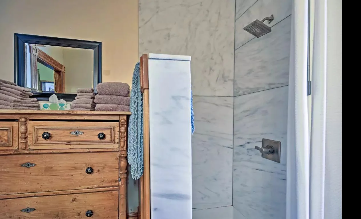 West Wing bathroom - No threshhold spacious walk-in marble shower