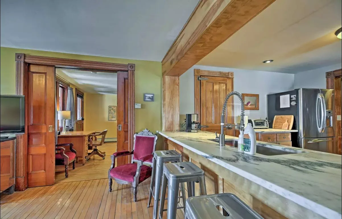 Huge marble kitchen counter, pocket doors, chef's kitchen