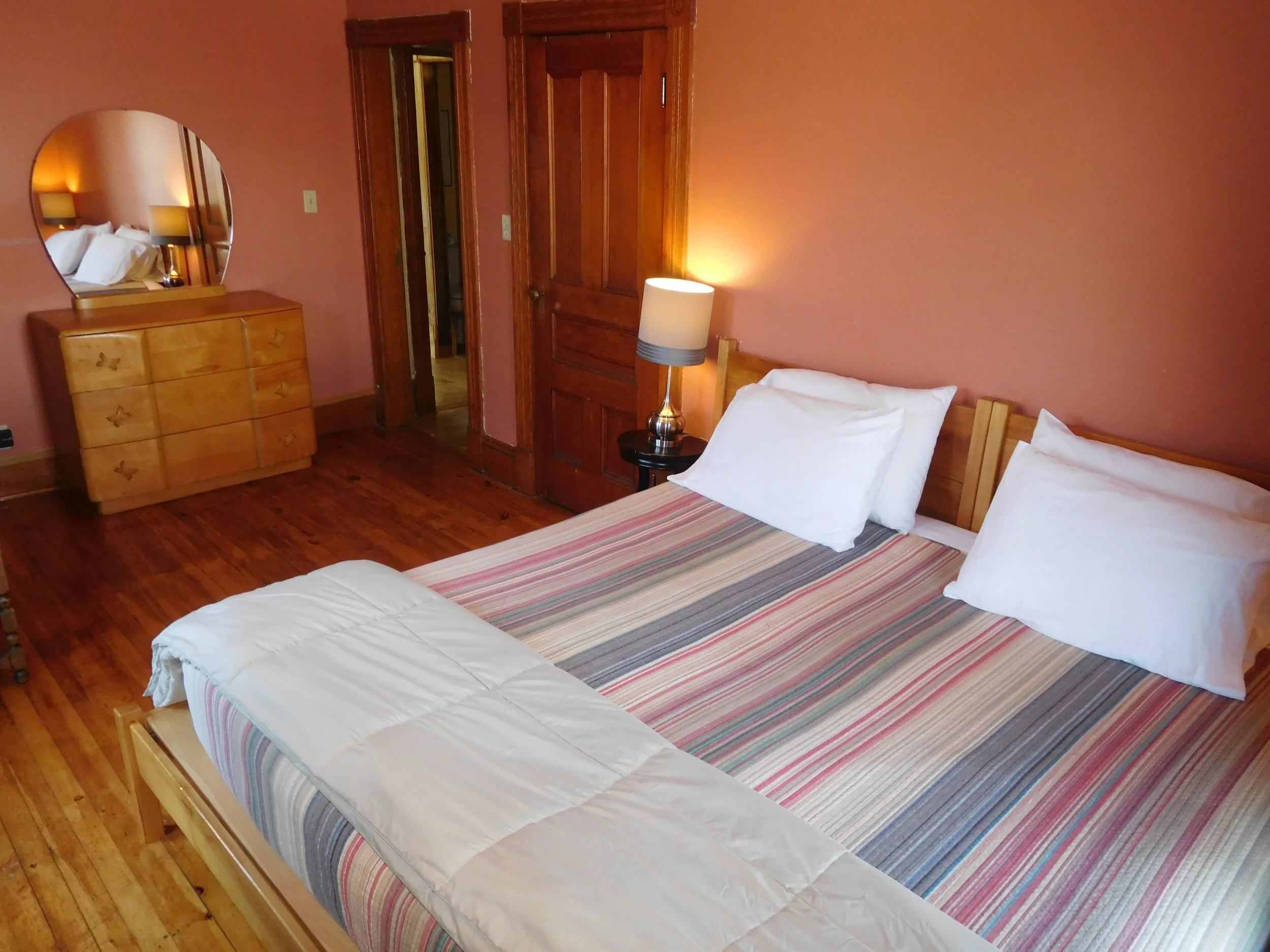 Left Wing master bedroom - hardwood floor, handmade bed,