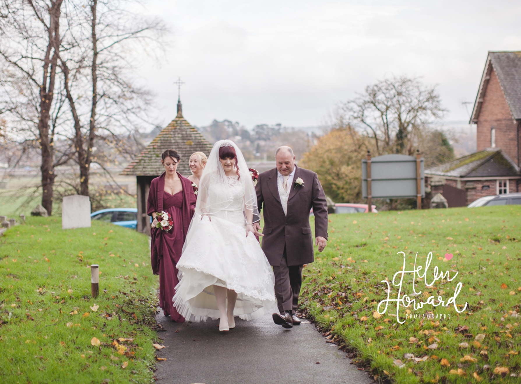 Wedding Photography in Staffordshire Bride and her Father walking to the church