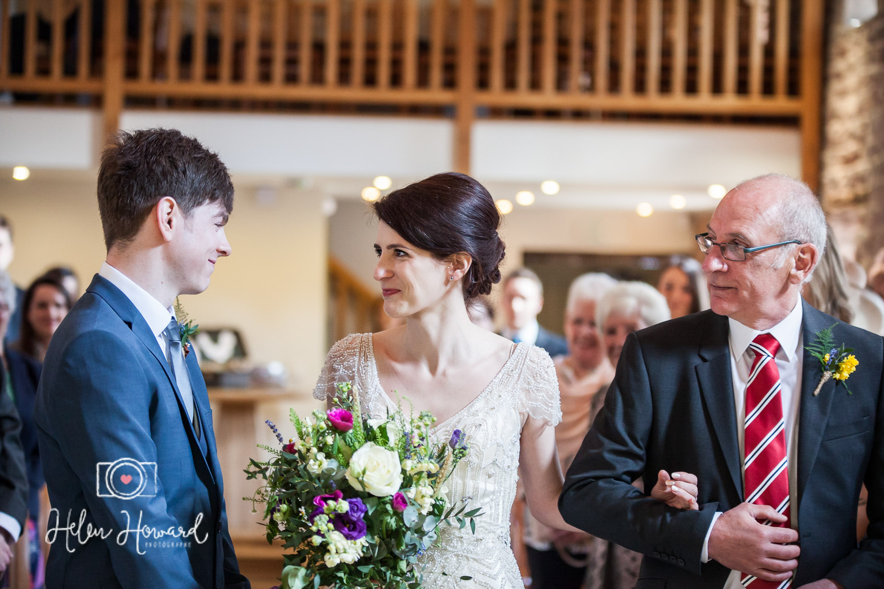 Wedding ceremony bride being given away by her dad