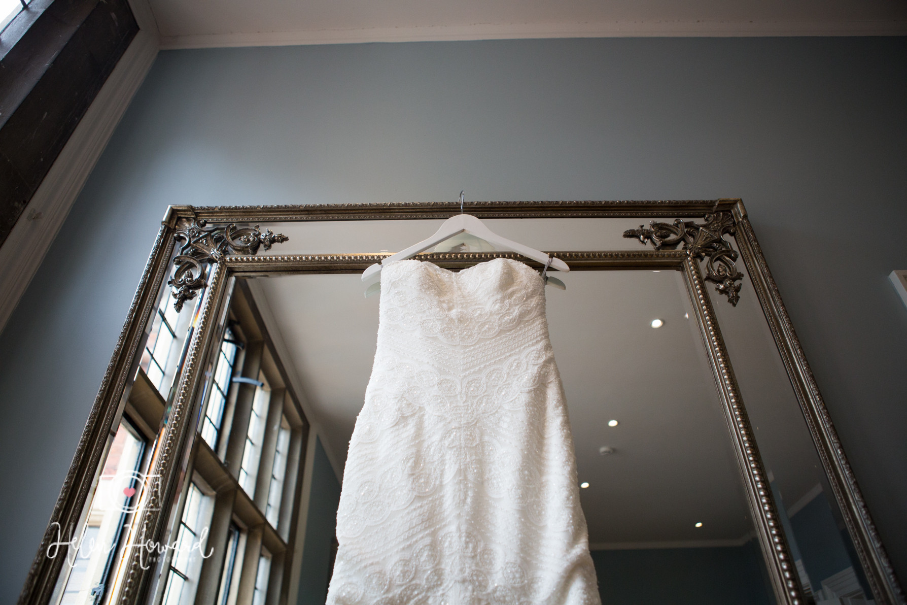 Dress hanging on a Mirror at Pendrell Hall Love is Not Enough Suite