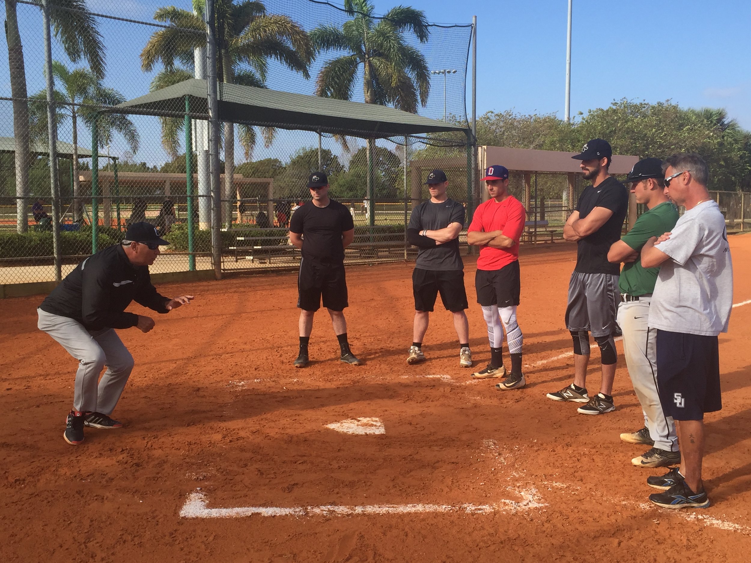  Professional Manager Carlos Lezcano working with Catchers at early workout. 