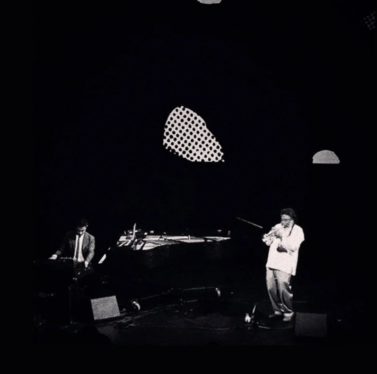  The What of The World,  2017, Performance, Digital Projection; Collaboration with Vijay Iyer at his residency at  The Kitchen , NY.  (pictured here with Wadada Leo Smith) The other musicians included: Imani Uzuri,  Mike Ladd, Arooj Aftab, and Sara S