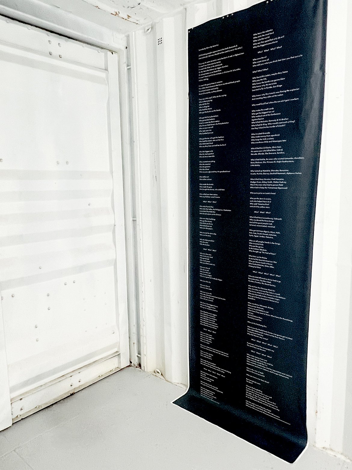  —
Somebody Blew Up America
(2001) poem by Amiri Baraka, Audio and 36”x 110” Print
 —
Audio of Baraka performing the poem while accompanied by a rendition of “Misterioso” by Thelonious Monk played throughout the space. 
