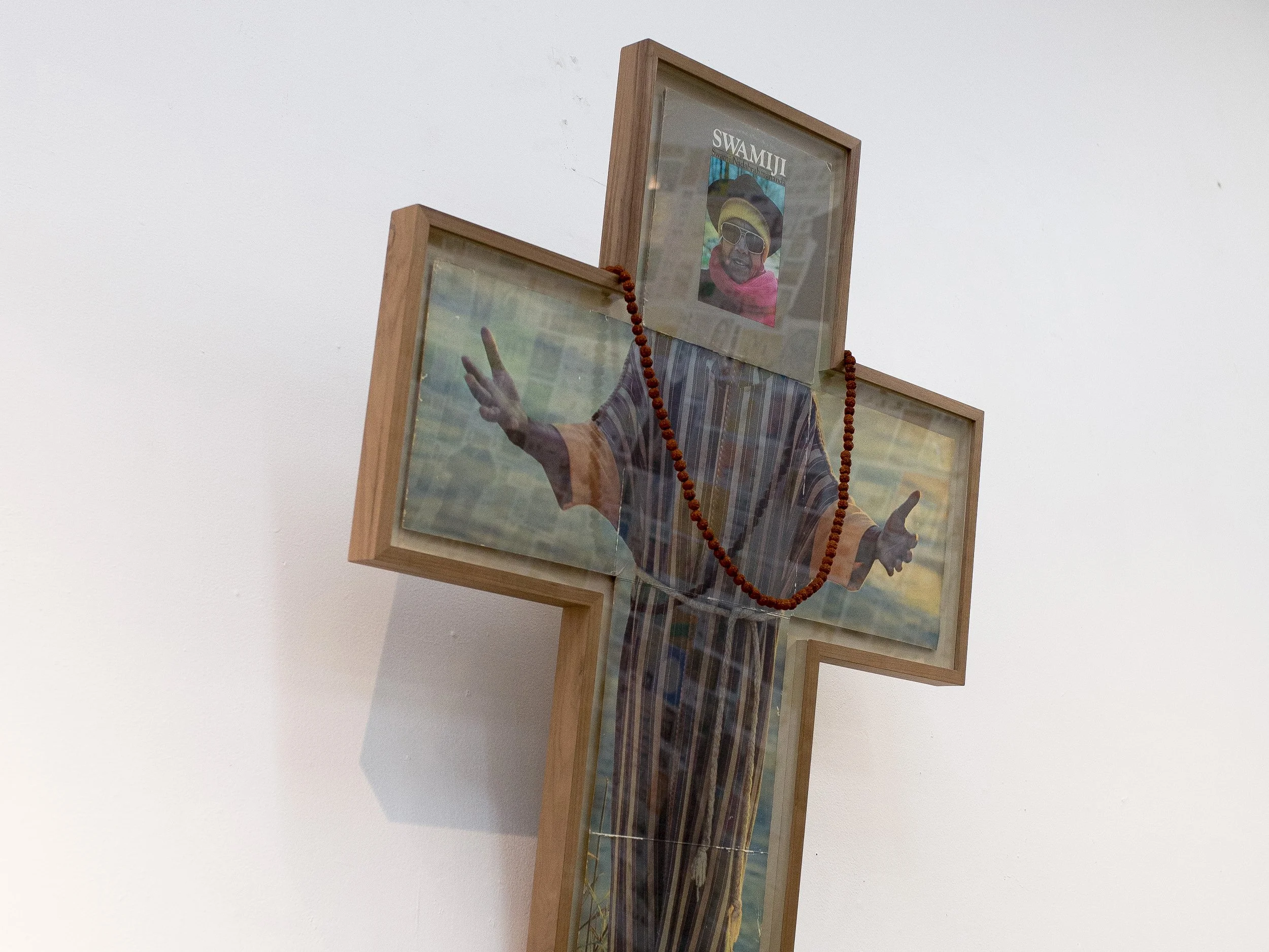  When We Opened Our Eyes,
They Had The Land and We Had The Bible,  2019, Collage (framed); Found Objects, Rudraksha Beads and Flowers, 54 x 42 x 4.5 inches