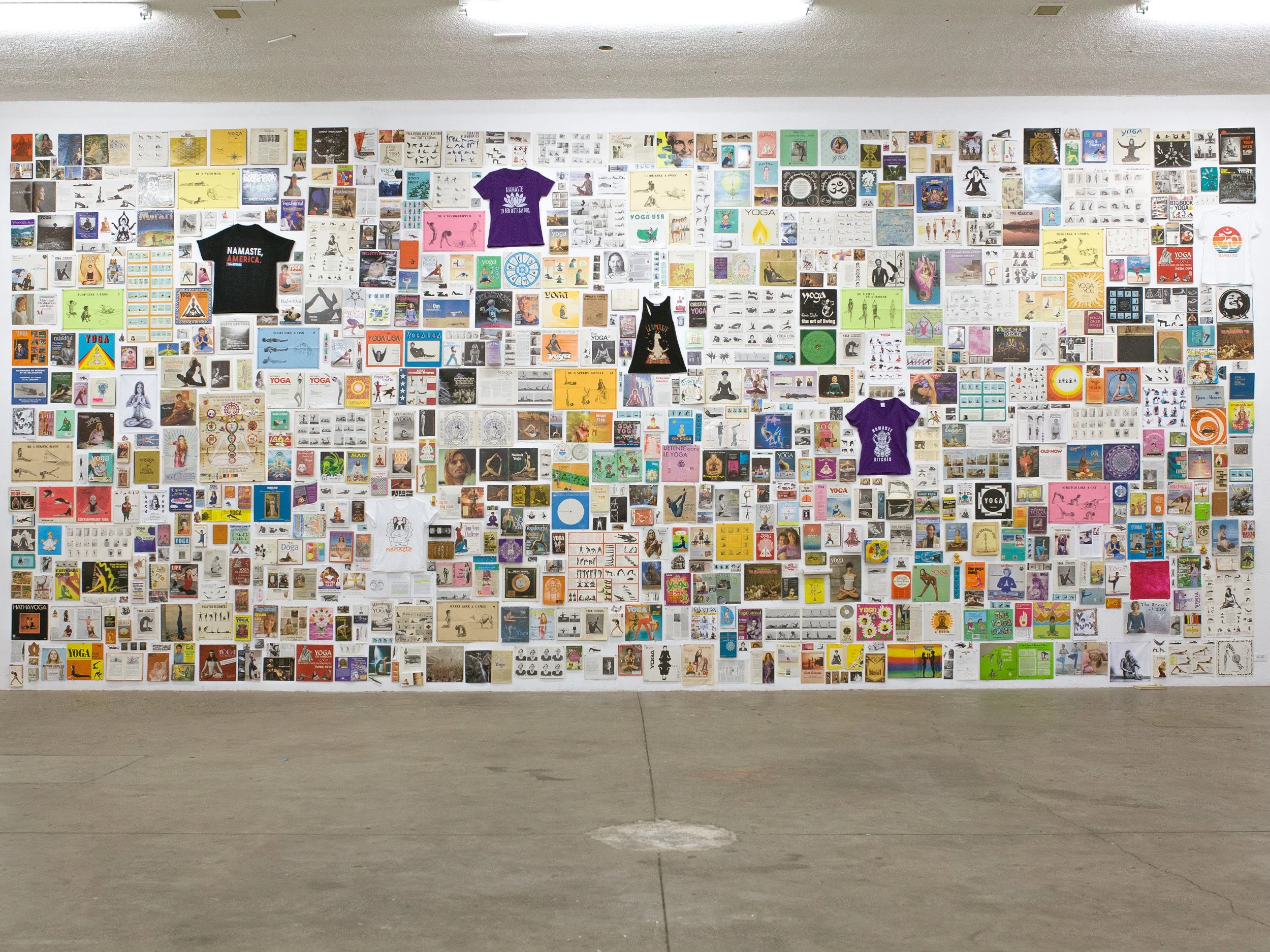  #WhitePeopleDoingYoga  2014-2019, Installation; Found Objects, 33.5 x 15 Feet