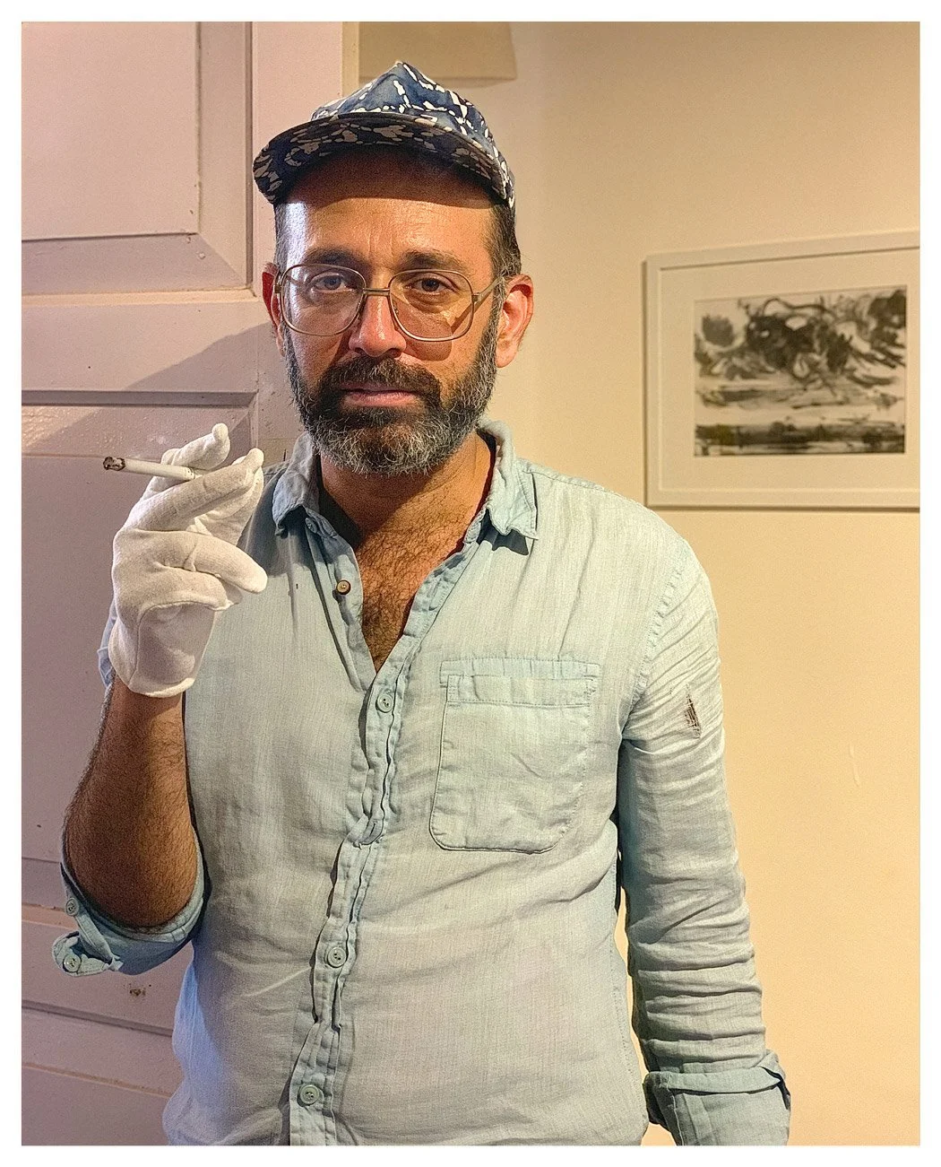 (2019)  Nikhil Chopra  taking a break from hanging a show at the Serendipity Arts Festival in Goa