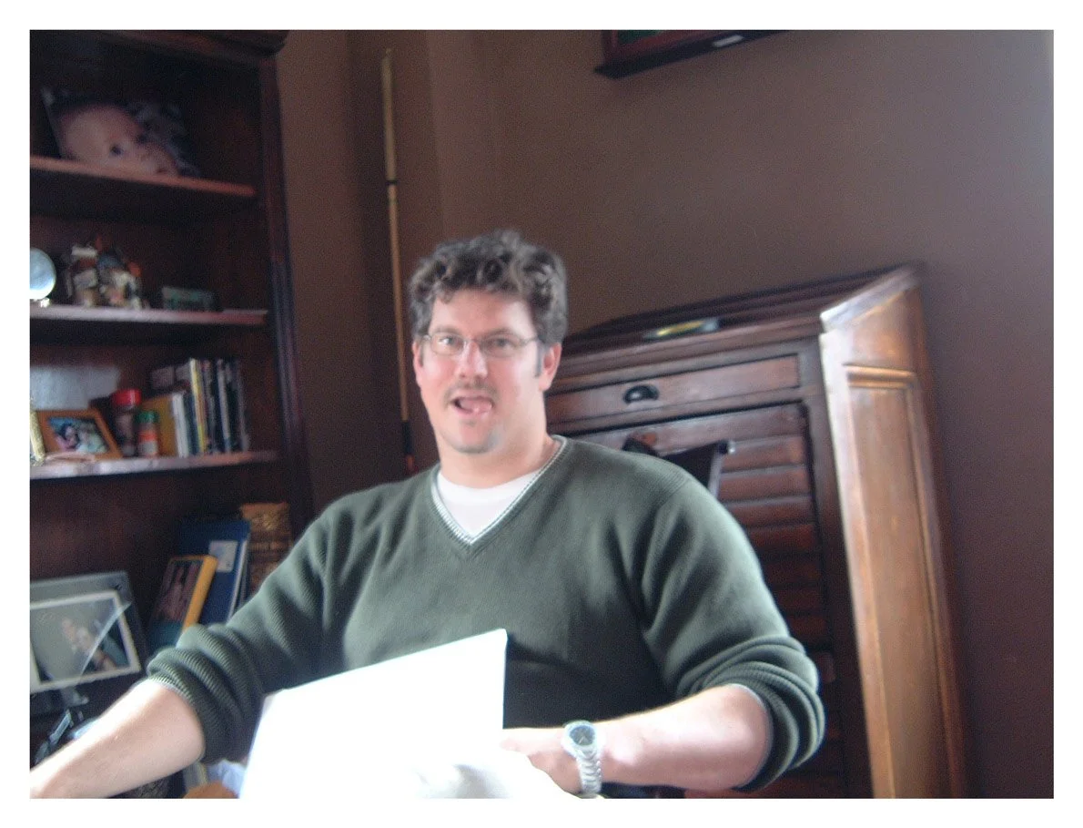 (2001) I took this photo of my then boss in the middle of him laying me off. He sold the small design studio (that I joined right after graduating college) to a larger company, and cashed out. I told him it was a day I needed to remember after taking