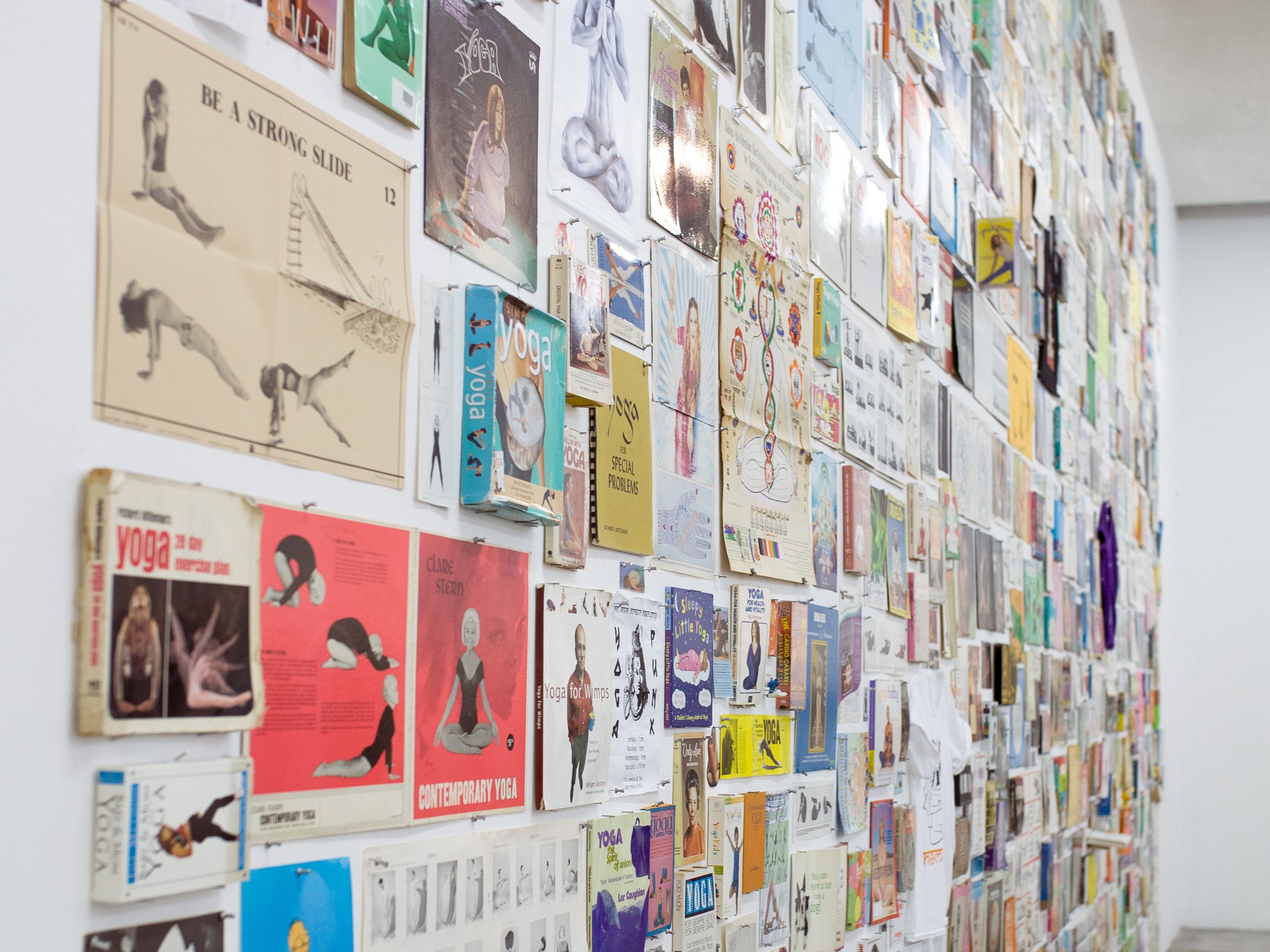  #WhitePeopleDoingYoga  2014-2019, Installation; Found Objects, 33.5 x 15 Feet