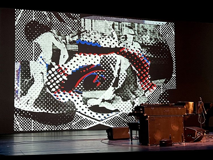  Prism 1965,  2023, Performance, Digital Projection; Collaboration between Vijay Iyer and Wadada Leo Smith.