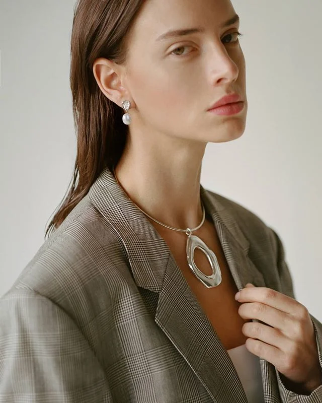 Sara wearing the Melt In Your Skin choker. The earrings with keshi pearls will be up on www.thirteenthstudio.com tonight! Photography @ianlanterman and Stylist @j.edralin
.
.
.
.
.
.
.
#silverjewelry #bespokejewelry #slowfashion #earrings #sterlingsilver #shopsmall #coolearrings #artdirection #bosswomen #femme #emergingdesigner #coolgirl#outfitoftheday #wiwt #wiw#outfitoftheday #jewelry #jewellery #handmade#minimalexperience #unlimitedminimal#mindtheminimal #vogue #minimalist #minimalove #keepitsimple #editorial #womenswear