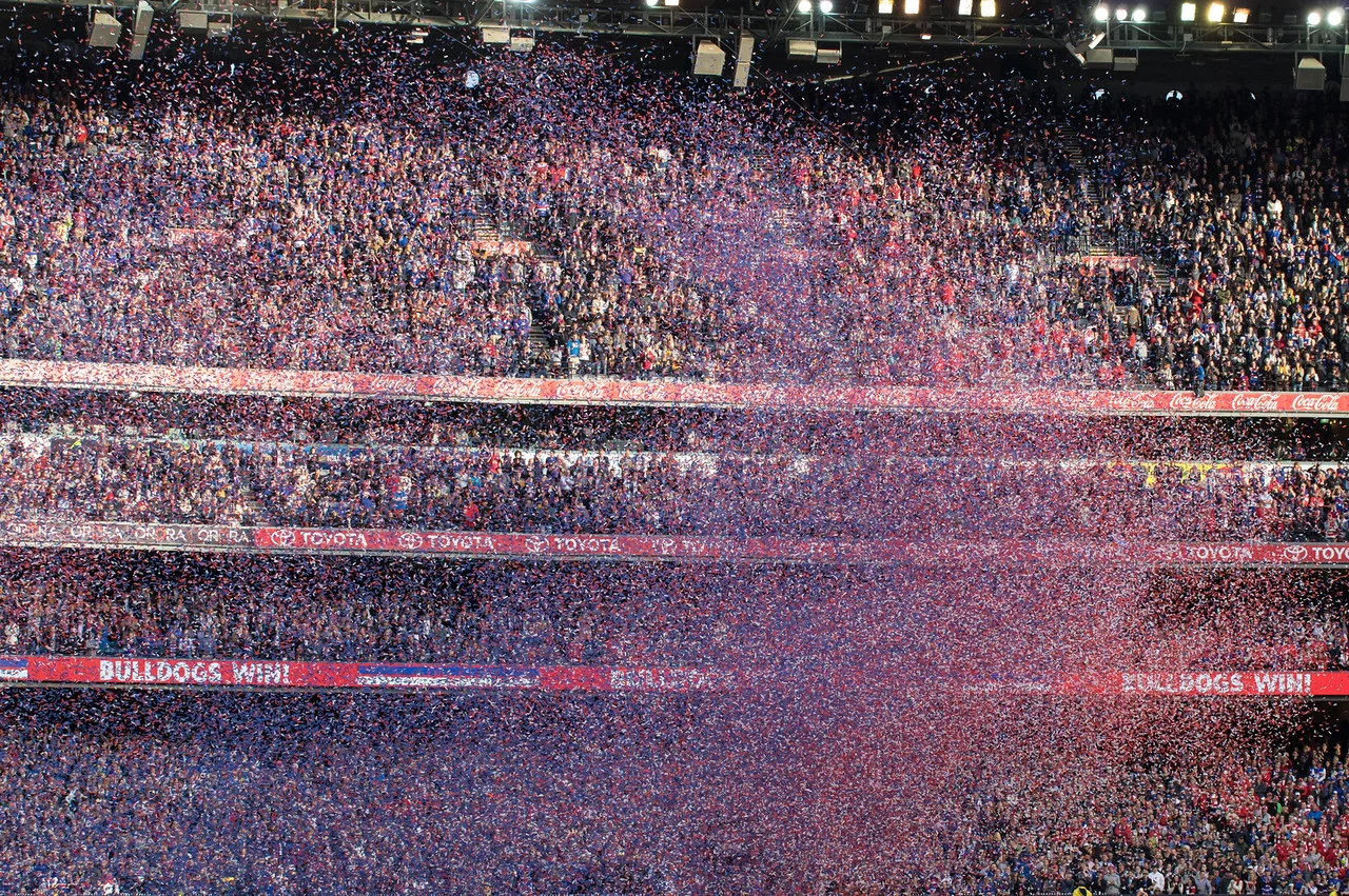 A few seconds after the streamers were released, the crowd and players are lost in colour.