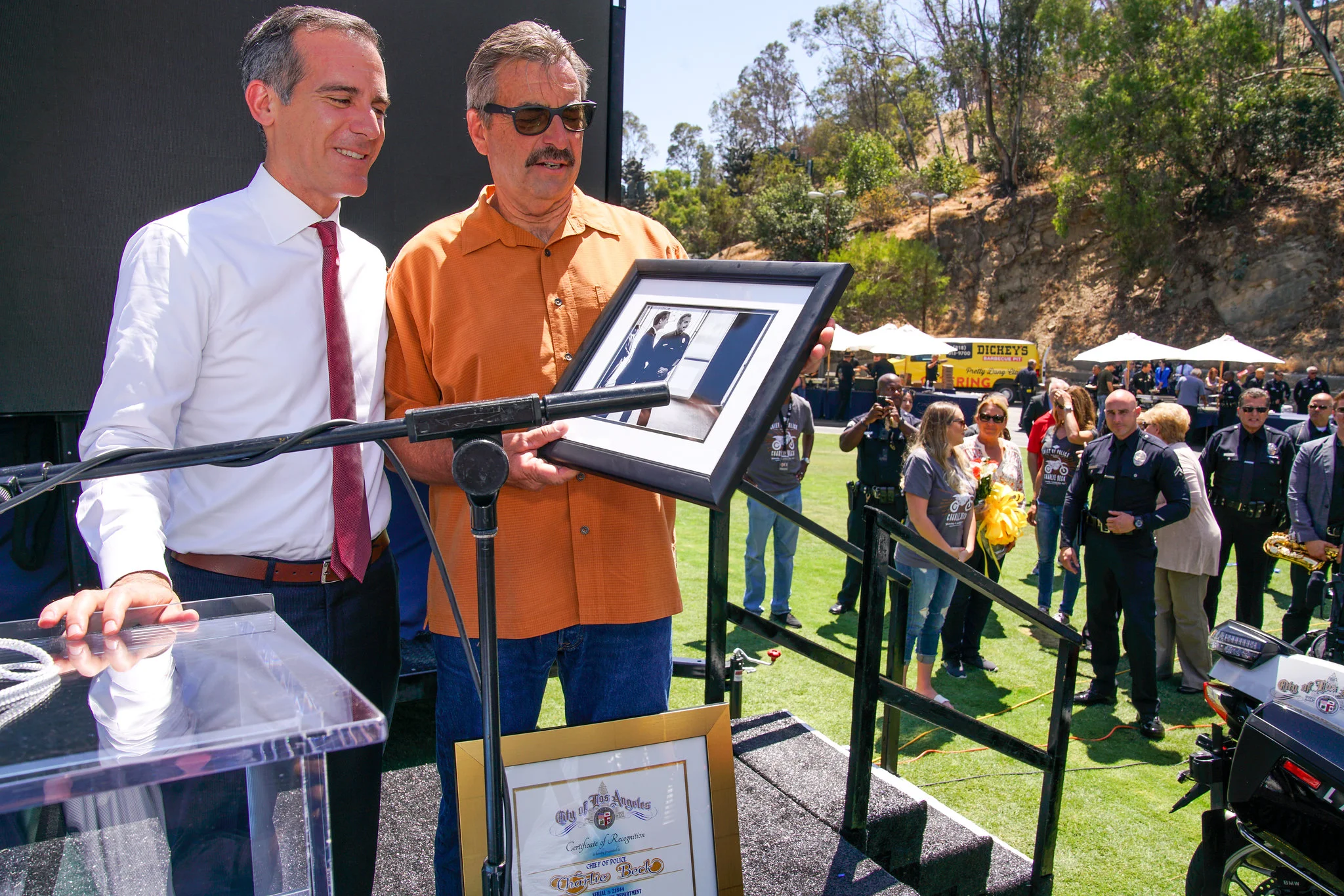 A personal favorite: a photo I took of Mayor Garcetti giving outgoing Chief Charlie Beck…a photo I took