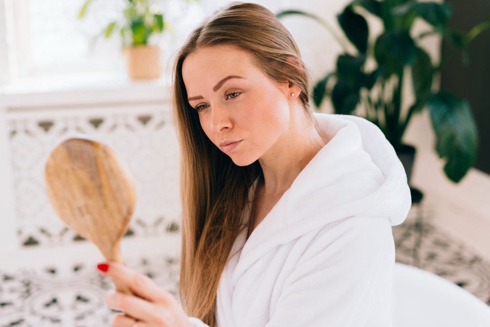Woman looking in the mirror