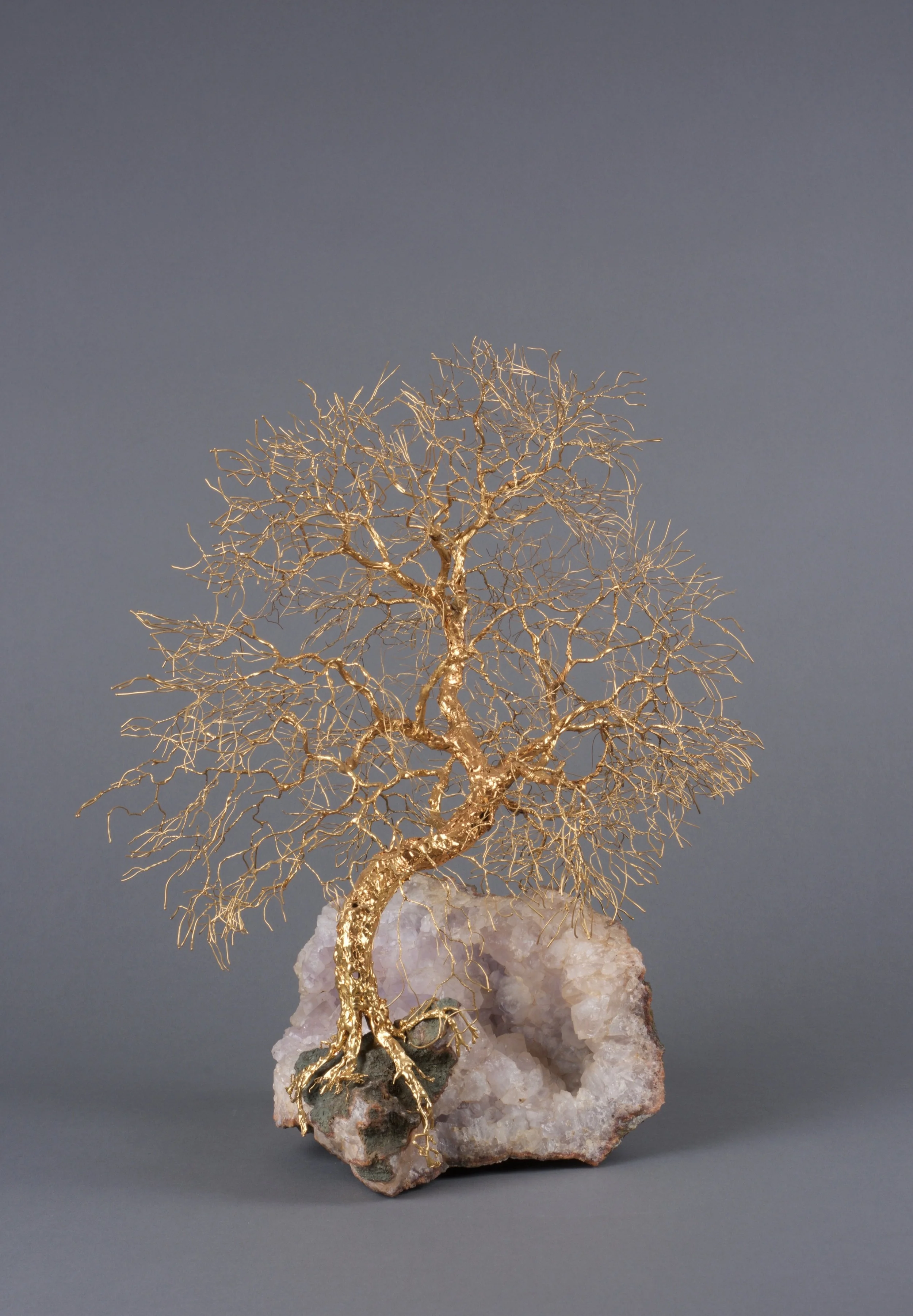Patrick Drinkwater Broken Skull , 2010 24ct gold plate on nickel, mounted on a white celestite quartz crystal geode 33x26cm