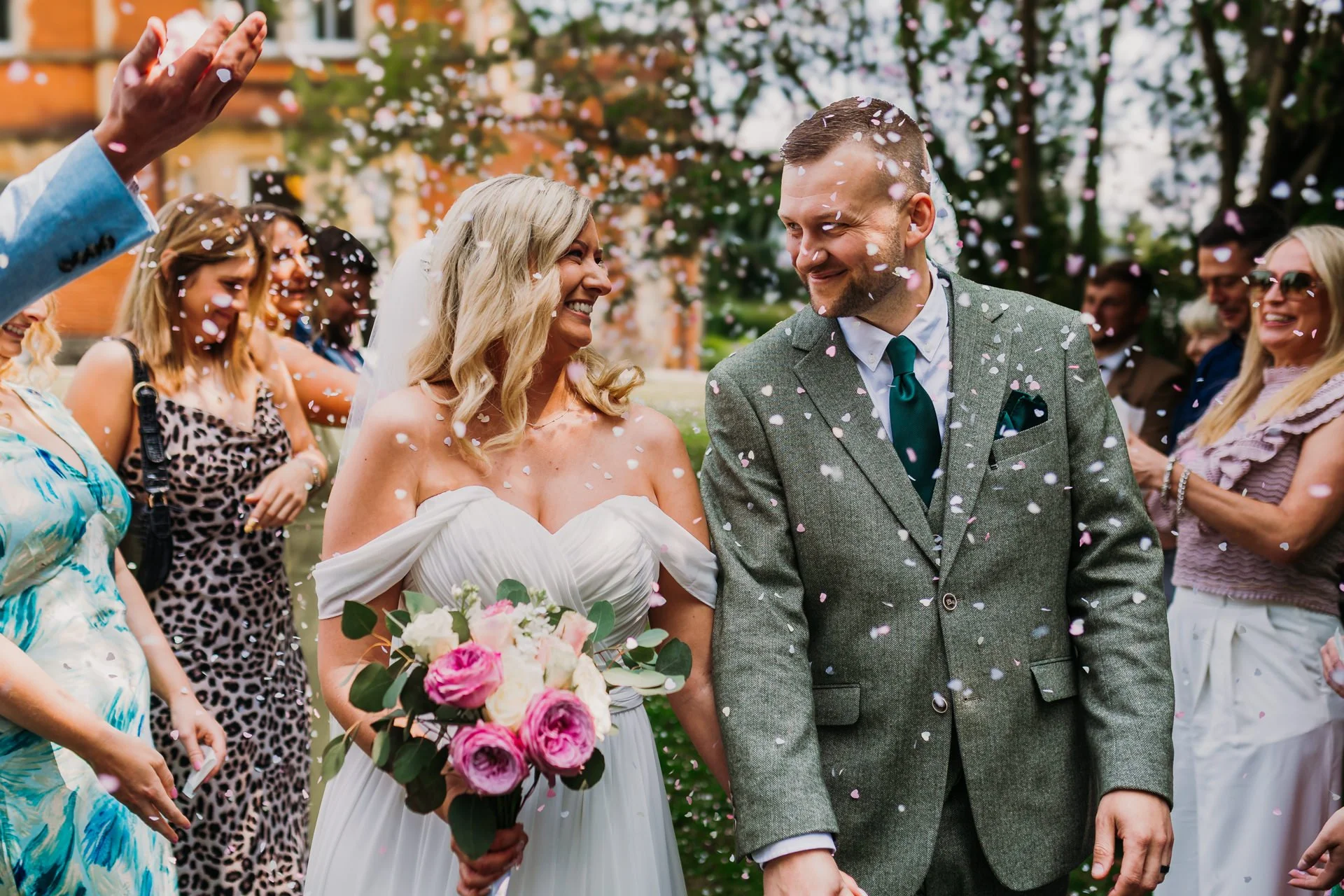 kent-bride-and-groom-with-confetti.jpg