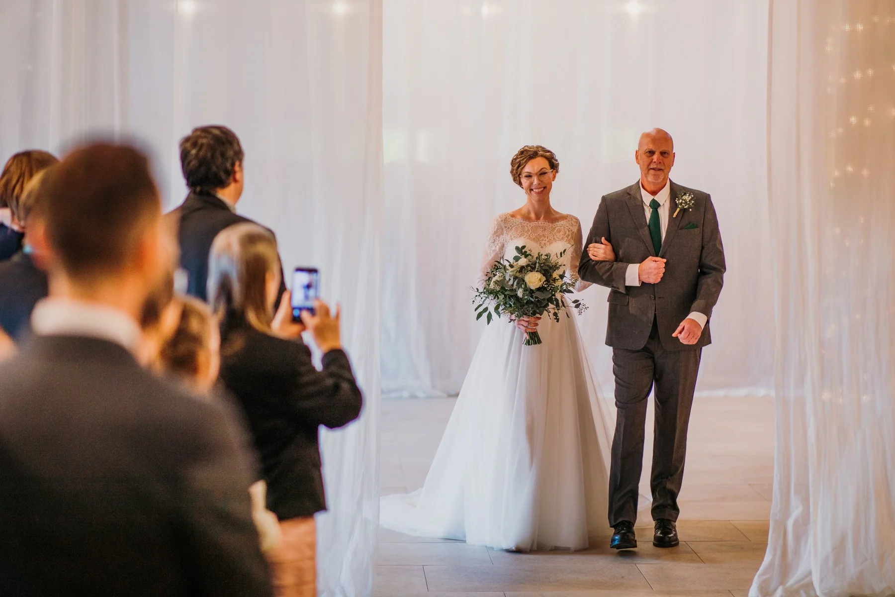 kent-bride-walking-down-the-aisle-at-old-kent-barn.jpg