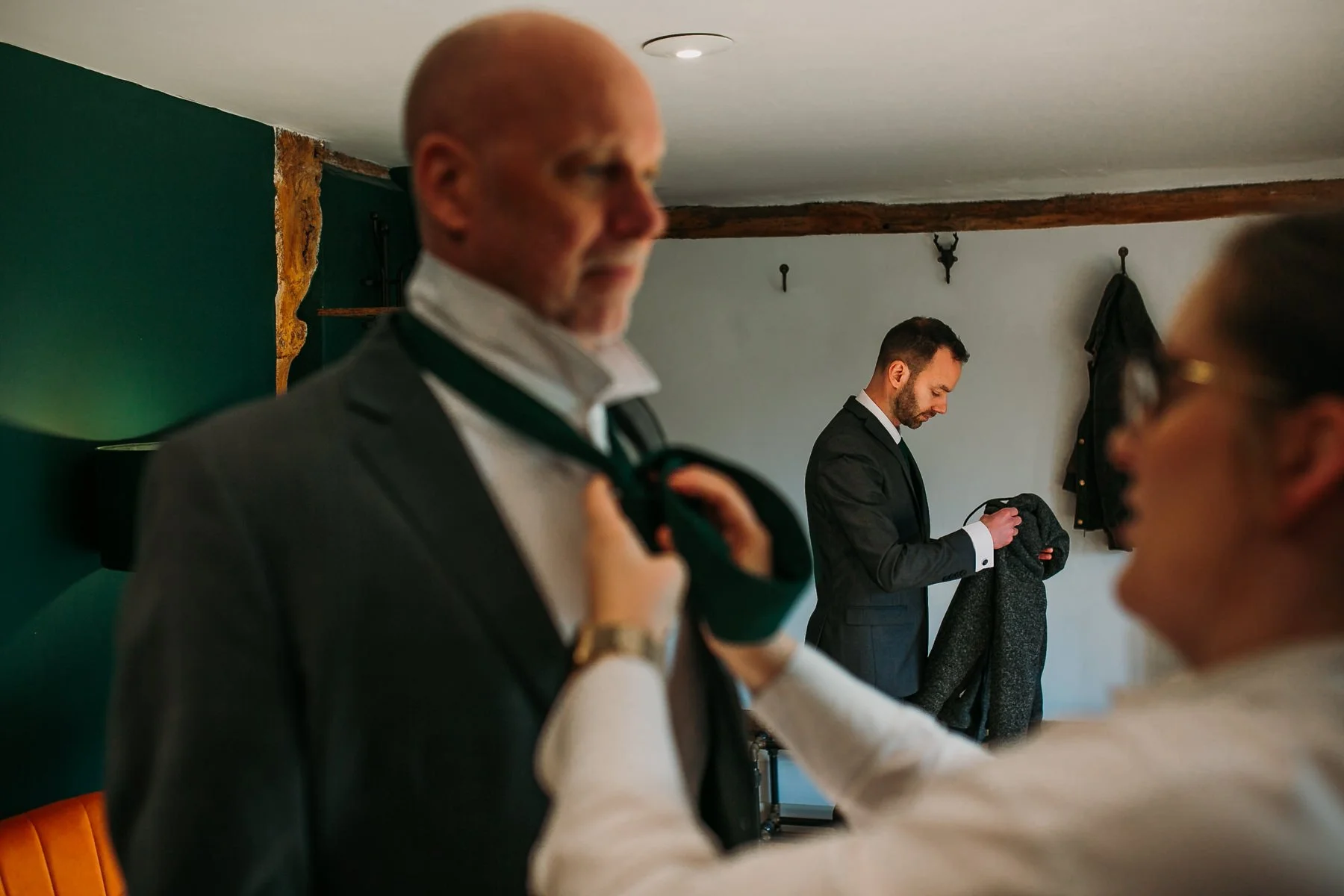 kent-father-of-bride-having-tie-done.jpg