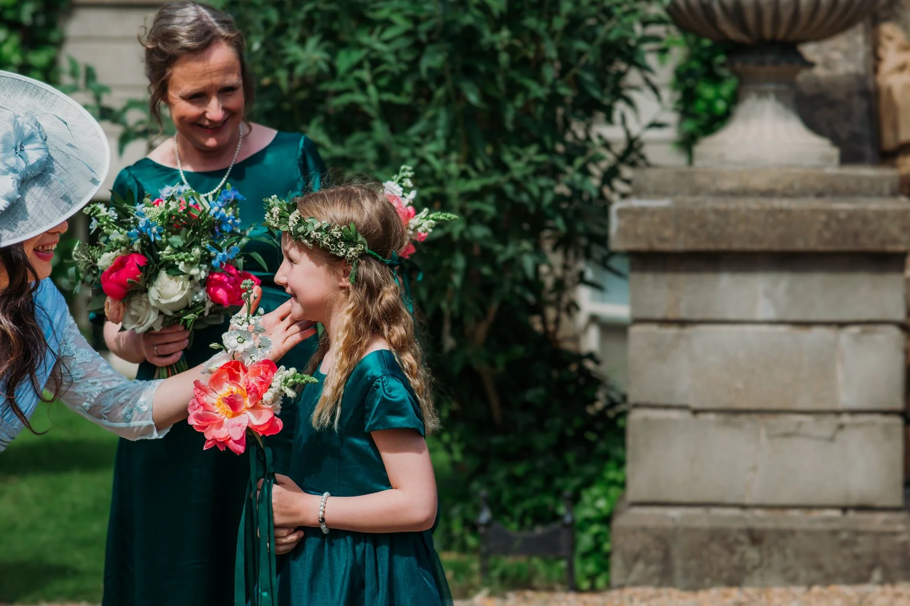 mother-of-bride-touching-face-of-flower-girl.jpg