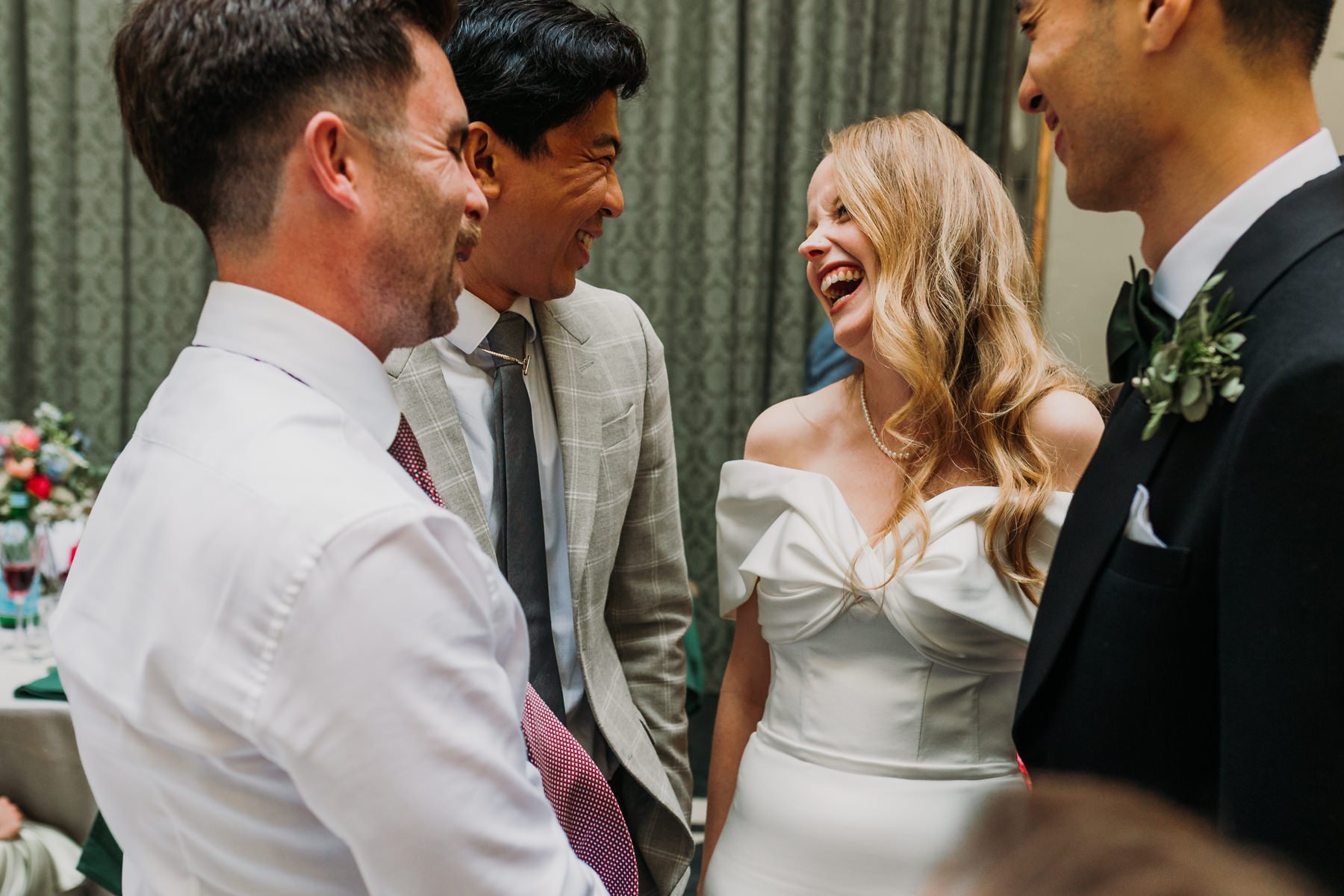 richmond-bride-laughing-with-guests.jpg
