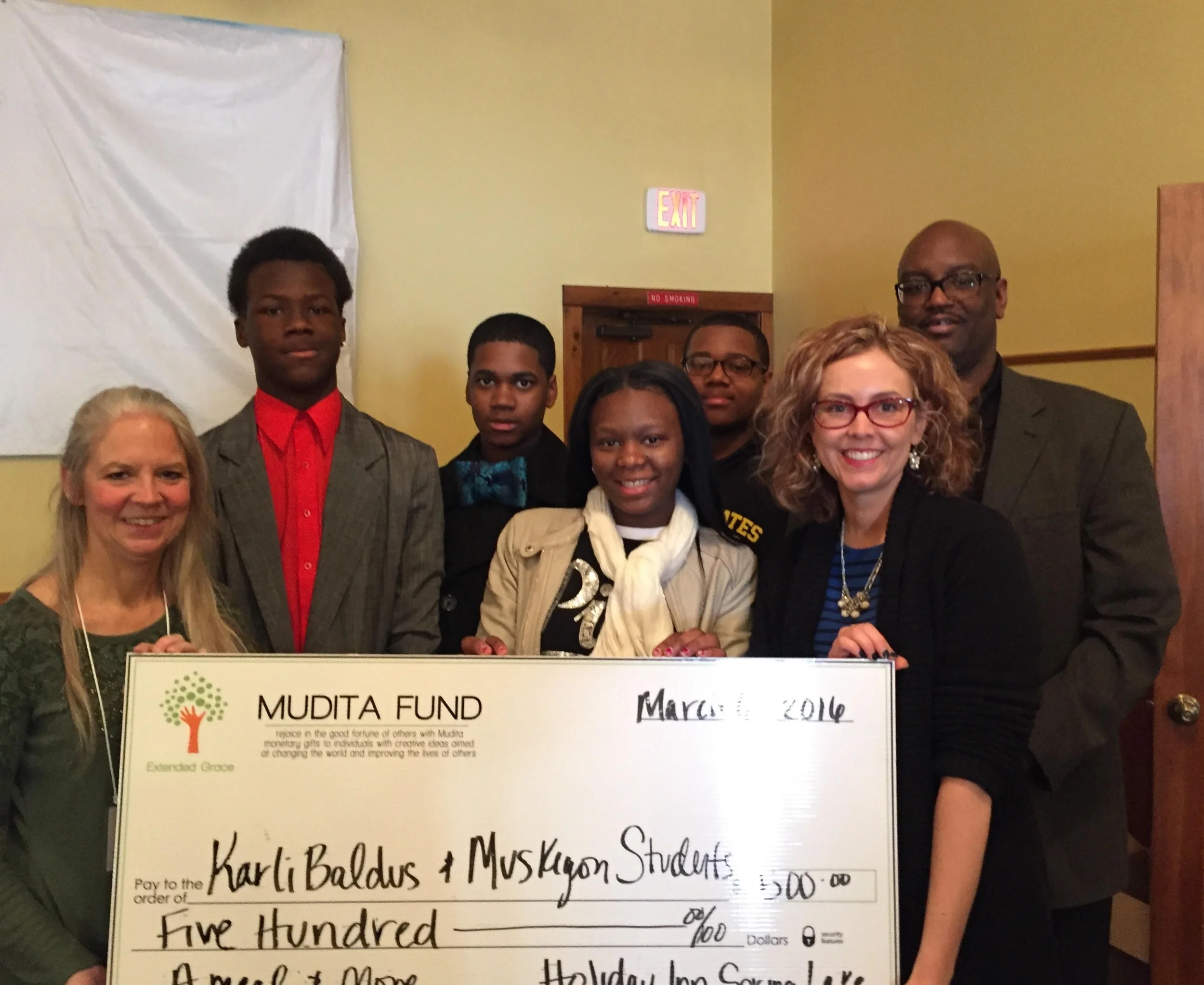 (L-R) Barbara Lee Van Horssen, Extended Grace experi-mentor and executive director; Tyrique Chalk; Armontae Hendricks-Johnson; Charity McClanahan; Keyshawn Crowley; Karli Baldus; Bernard Loudermill, Muskegon High School dean of students.