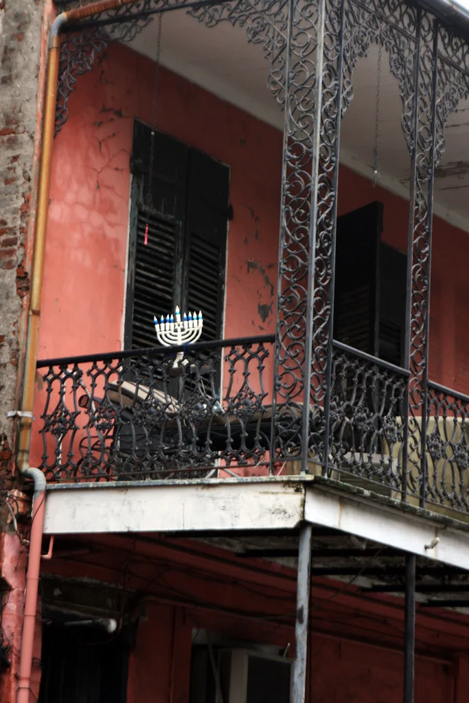 Menorah on French Quarter Balcony. Photo by Quinn Dombrowski via flickr.