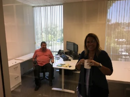 Mike V. and Orchid getting a feel for Mike's new office
