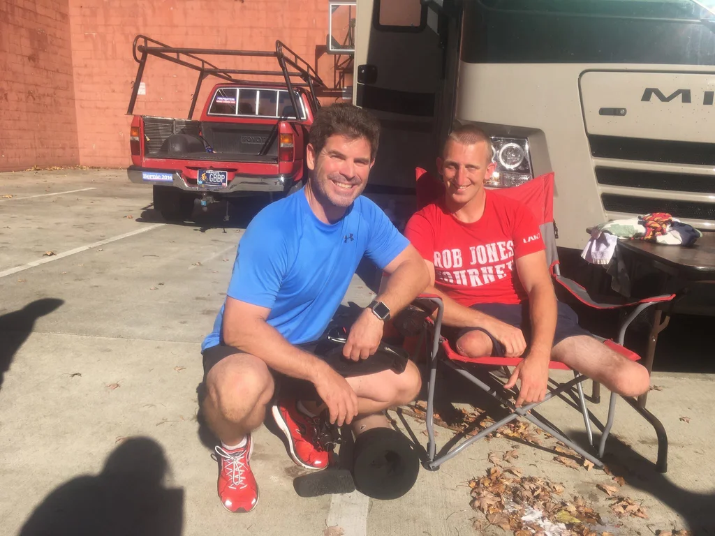 Expert Consultant Paul Viau with marine veteran Rob Jones after running a marathon together