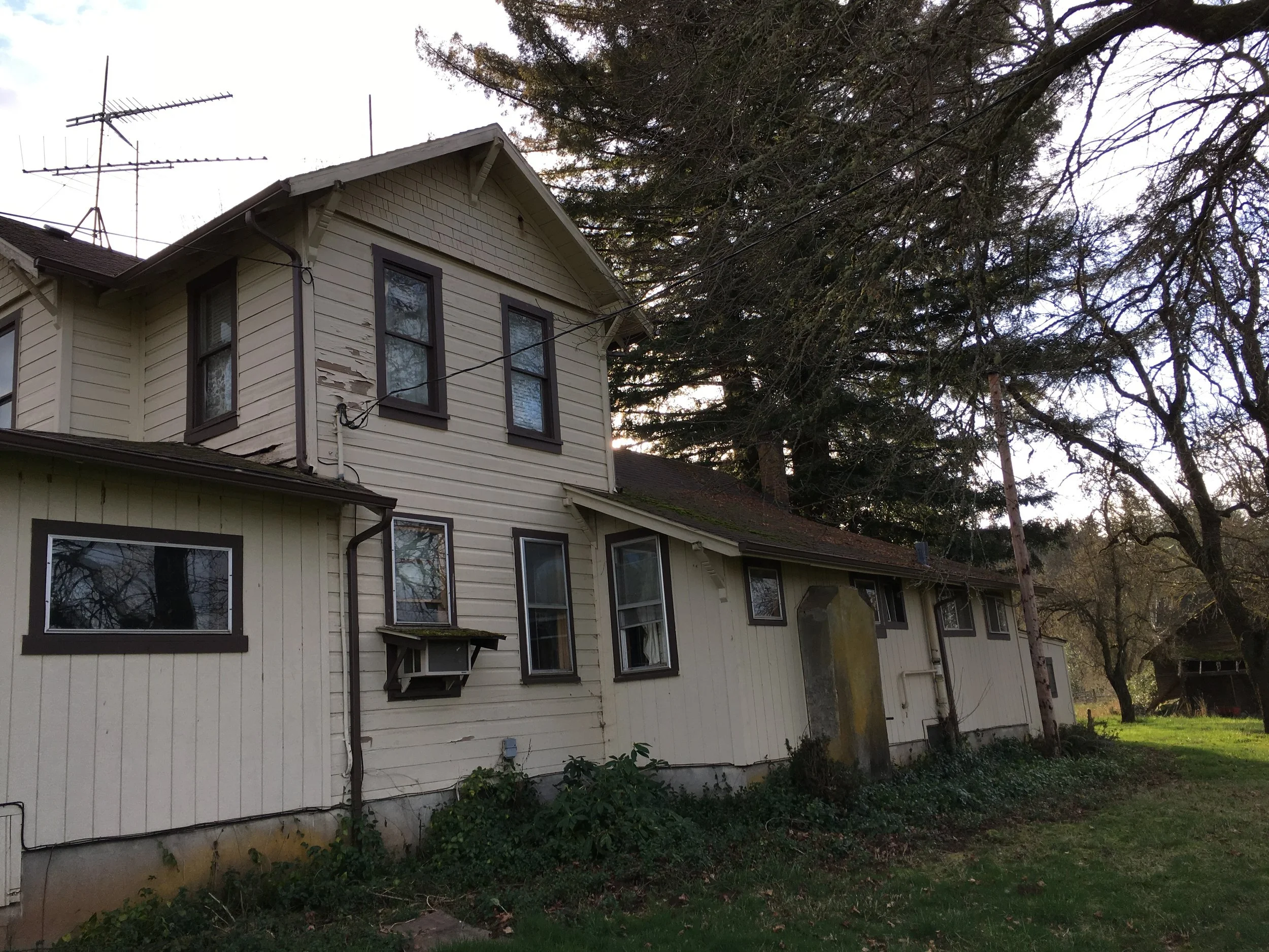 As you can see, the exterior of the residence needs repairs and new paint. 