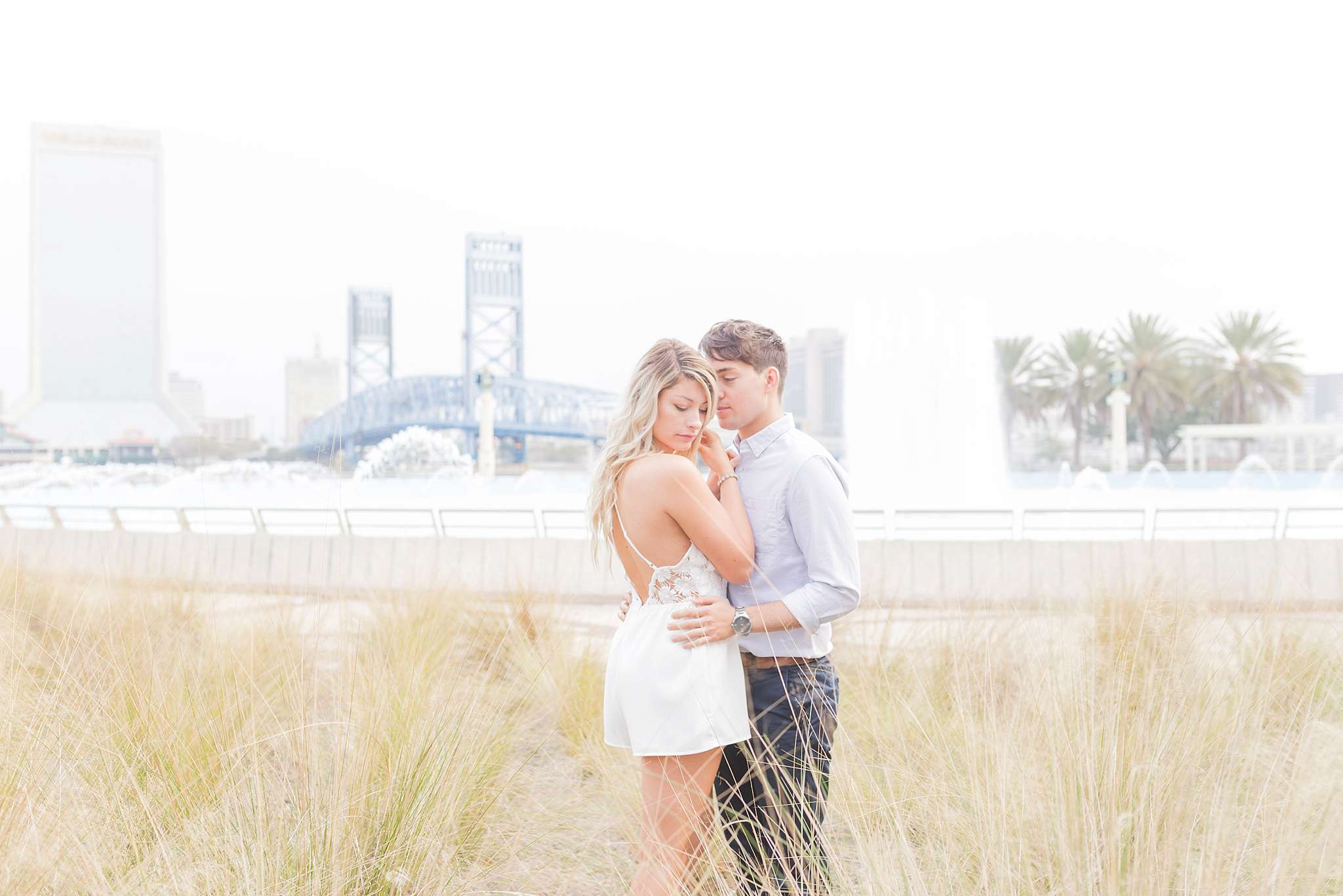 Surprise engagement session in downtown Jacksonville, FL. A surprise proposal taken place on top of buildings, and skyscrapers in Florida urban area.