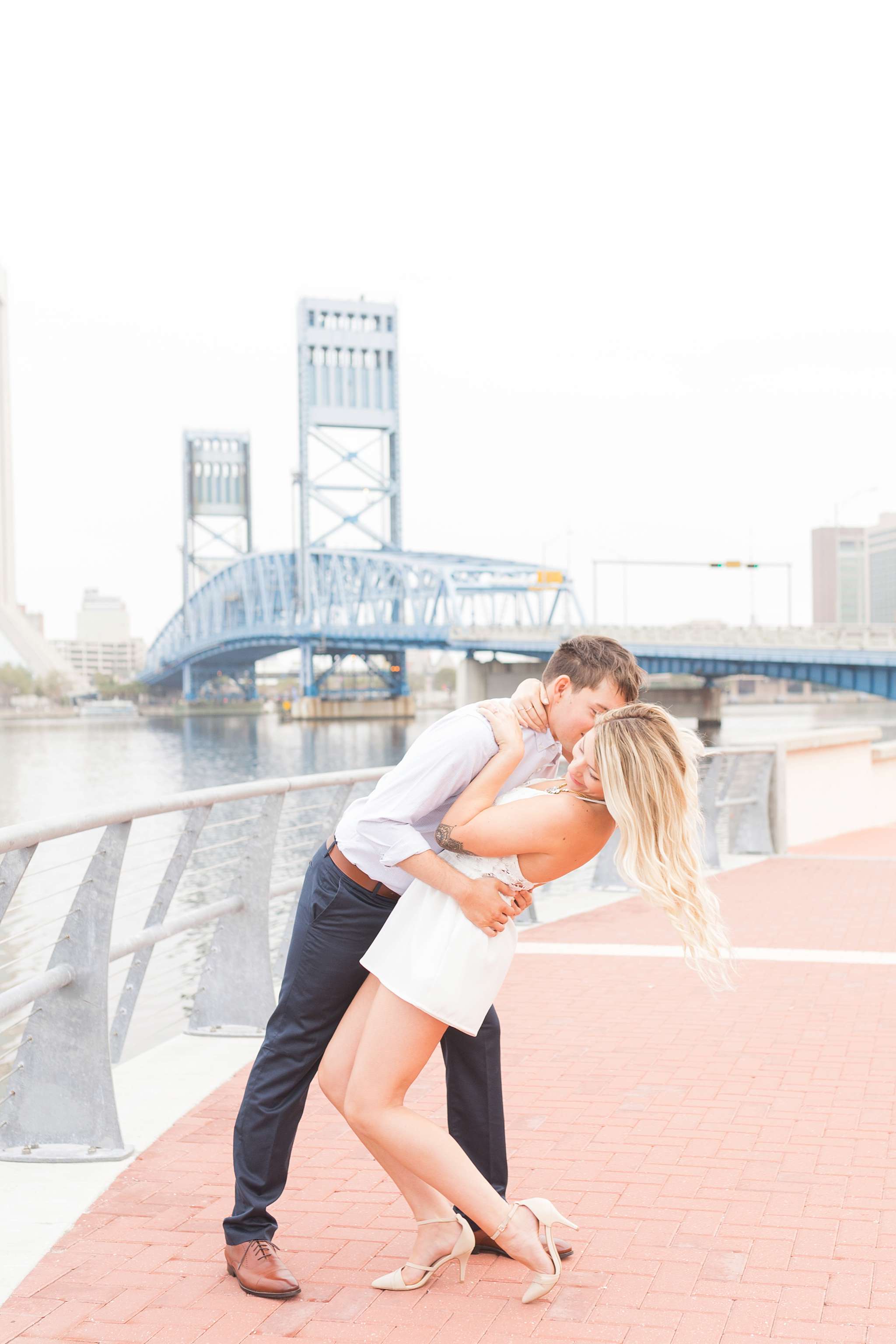 Surprise engagement session in downtown Jacksonville, FL. A surprise proposal taken place on top of buildings, and skyscrapers in Florida urban area.