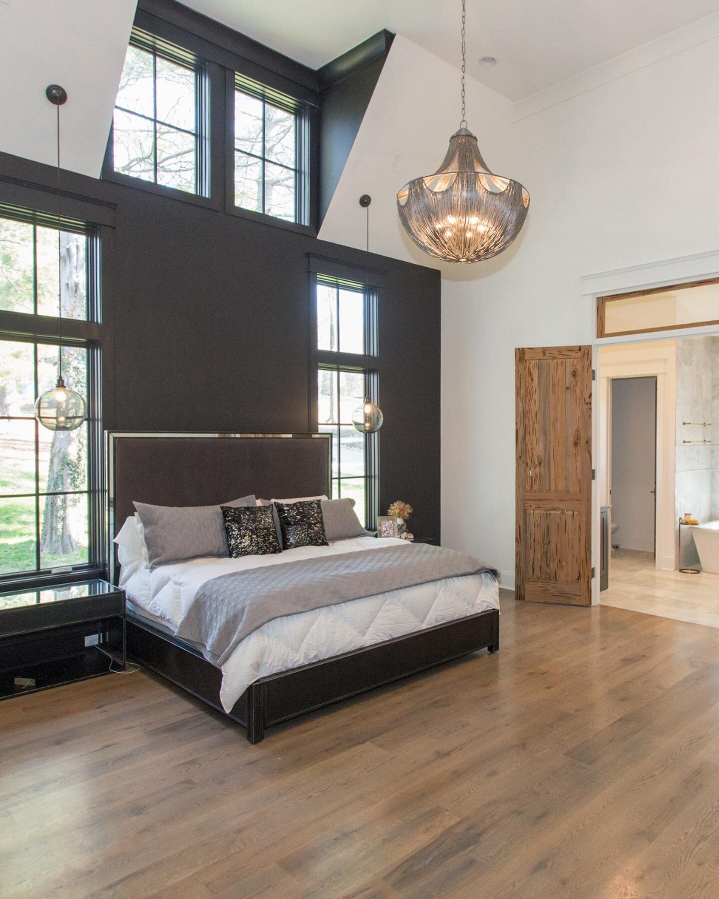 Step into this suite! The high ceilings &amp; custom accent wall lead to a cozy master bath.
.
.
#nashvillehomes #nashvilleluxuryhomes #luxuryhome #designinspo #exteriordesign #housegoals #designinspo #luxurybuilder #customconstruction #custombuild #