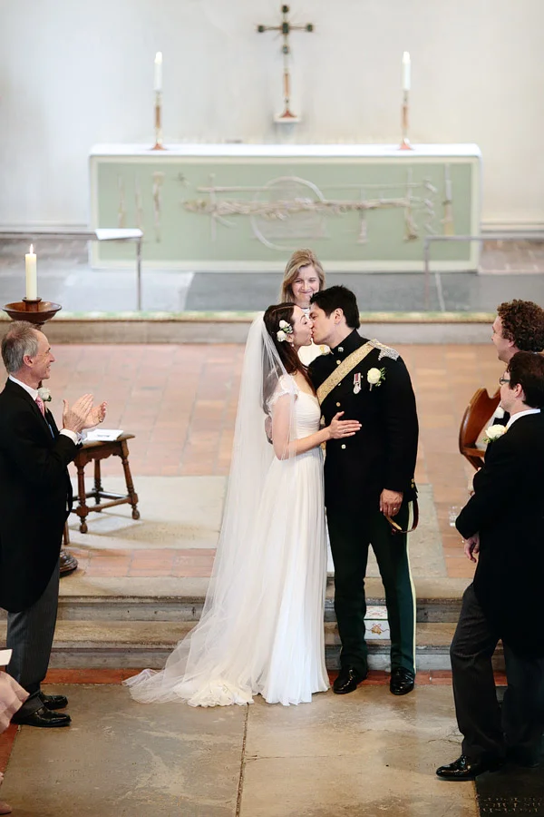 Surrey-wedding-photographer-first-kiss.jpg