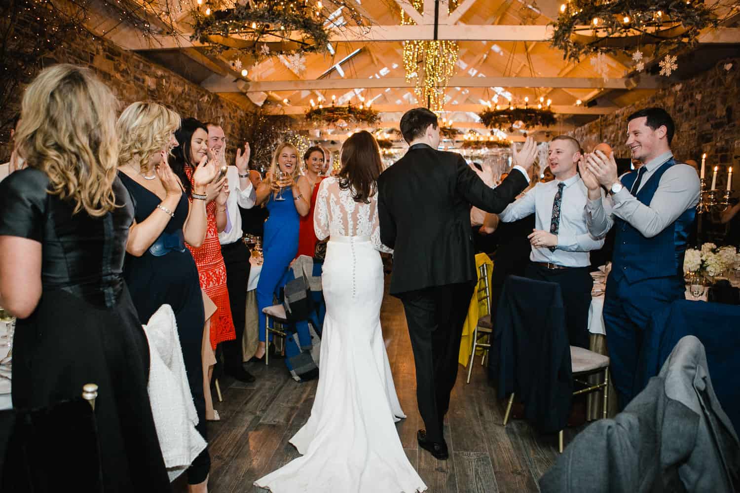 Bride and Groom Enter Wedding Reception in the Banqueting Hall in Ballymagarvey Village