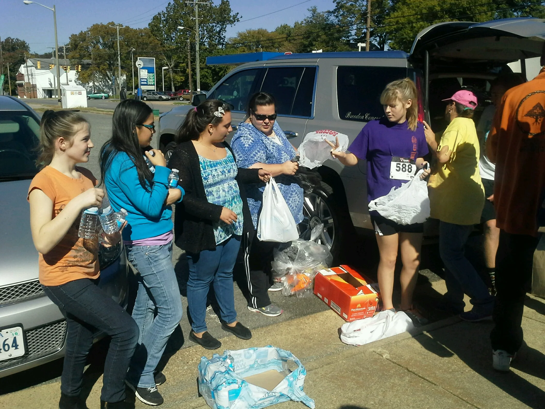 The "Rainbow Girls" participate as their community service project.