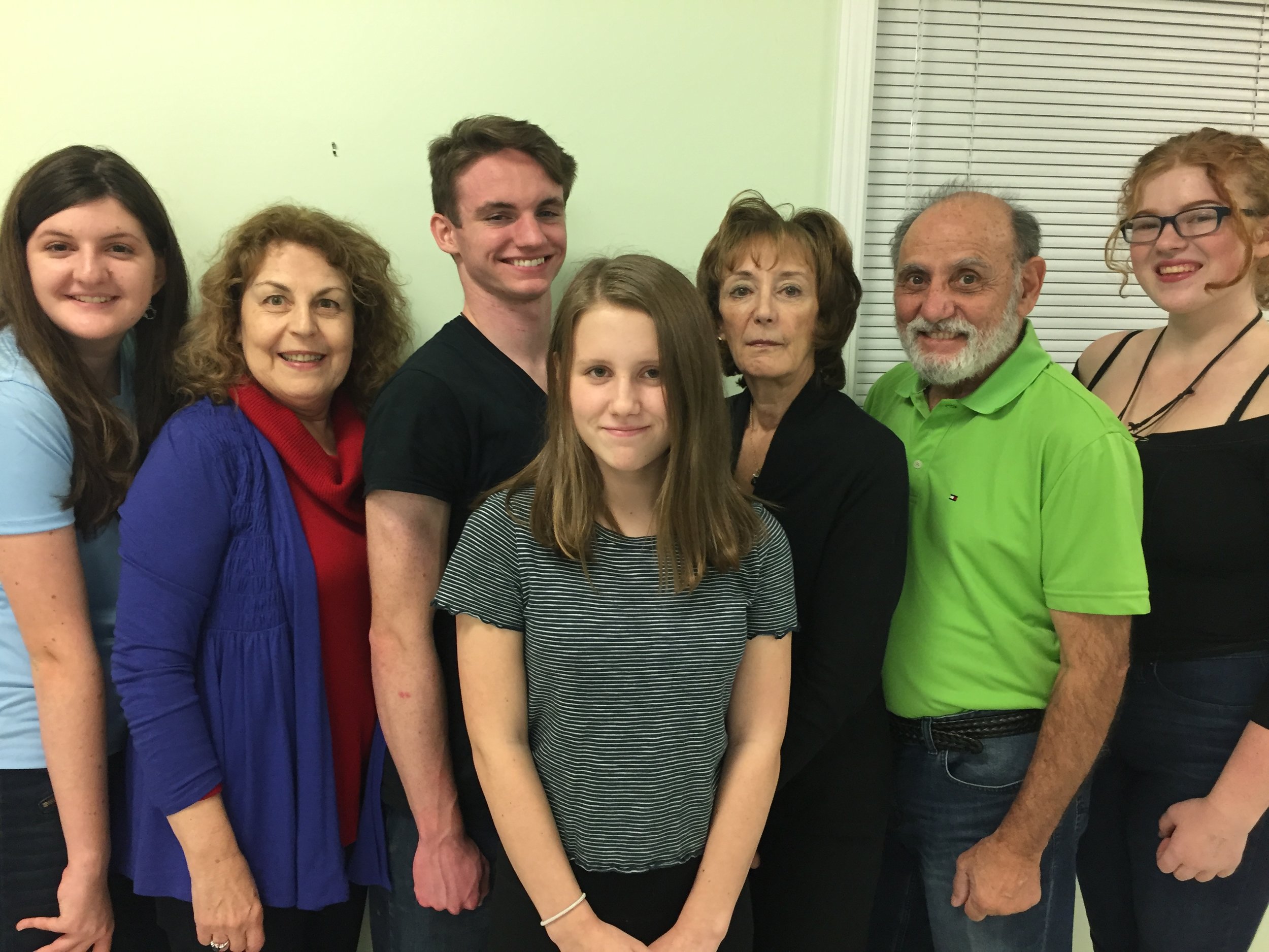 ( L to R) Season Ciriello, Hillary Leibowitz, Johnny Drumgoole, Summer Tyler, Denise Mann, Carmine Garritano, Ellie Hansen. (Missing: Jeanette Farrell and Andrew Field.)