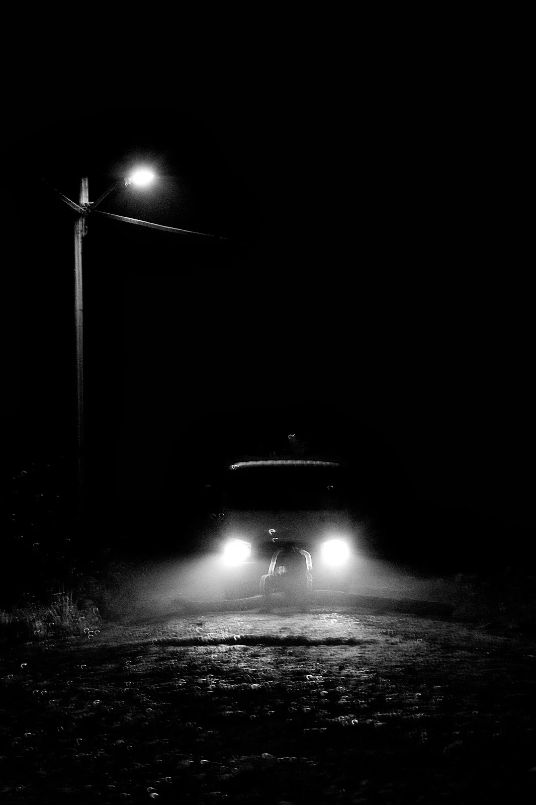 a drunk Waorani man sets up a roadblock, barring oil company trucks from passing late in the night
