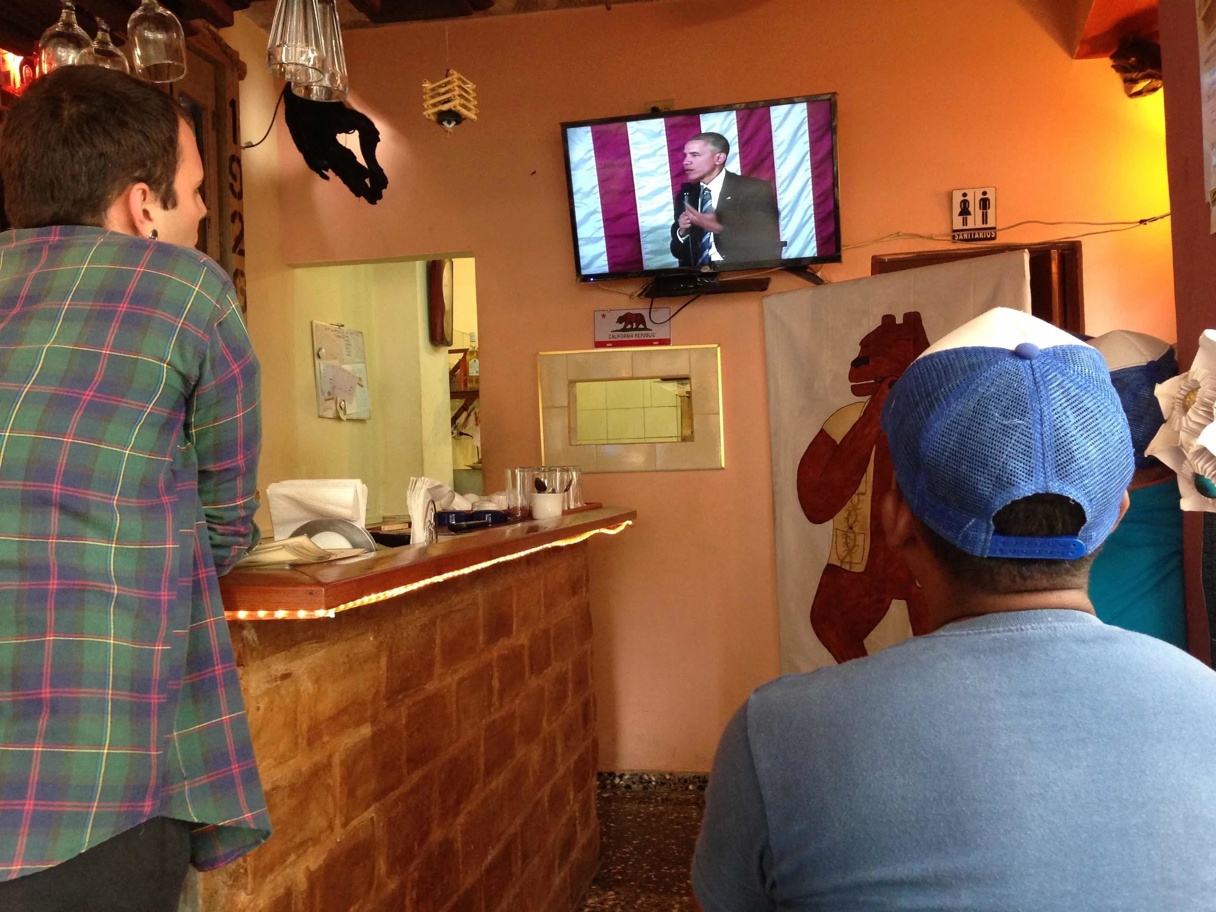 Watching Cubans watch Obama.