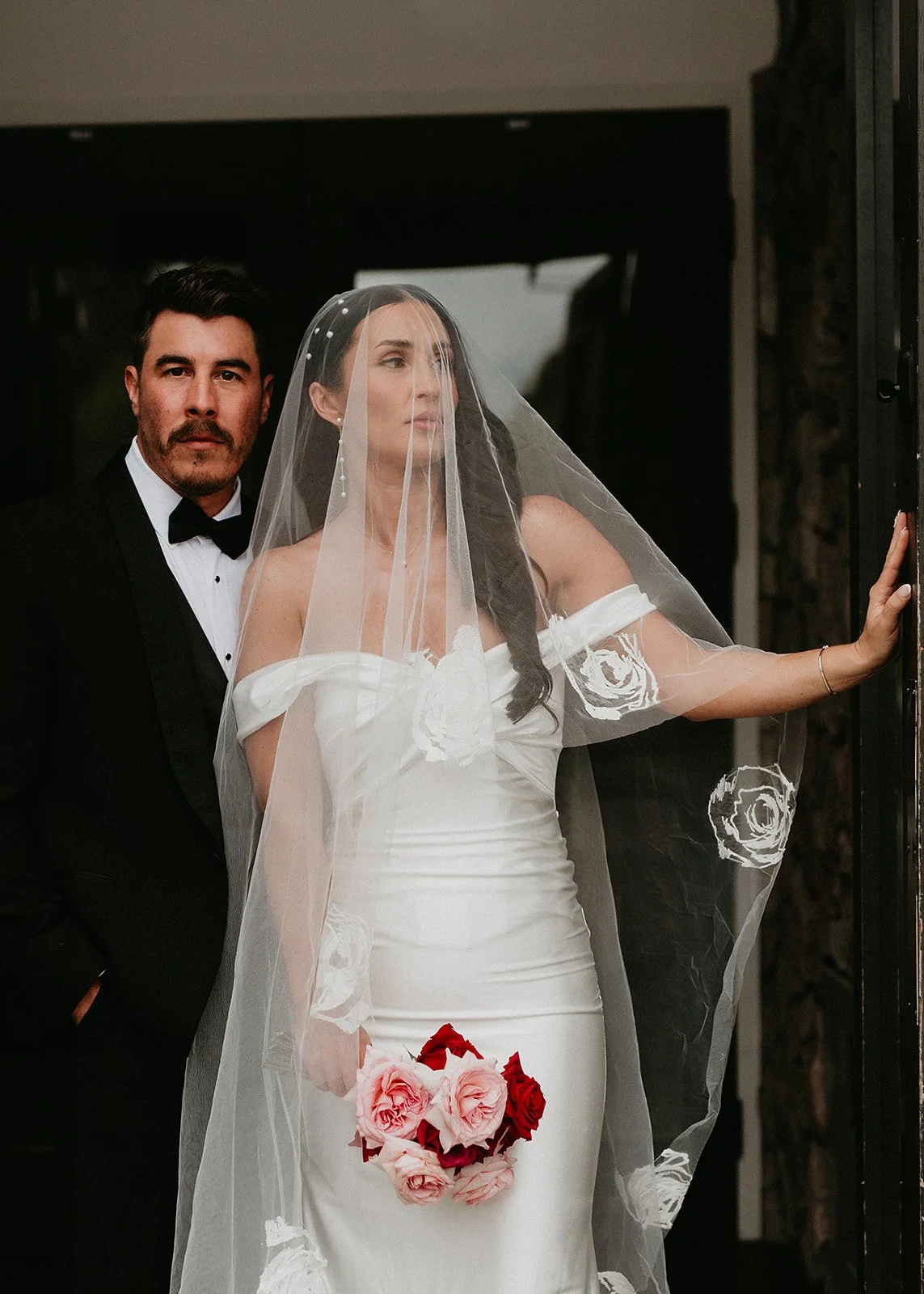 Bride and groom pose for Colorado elopement photography package