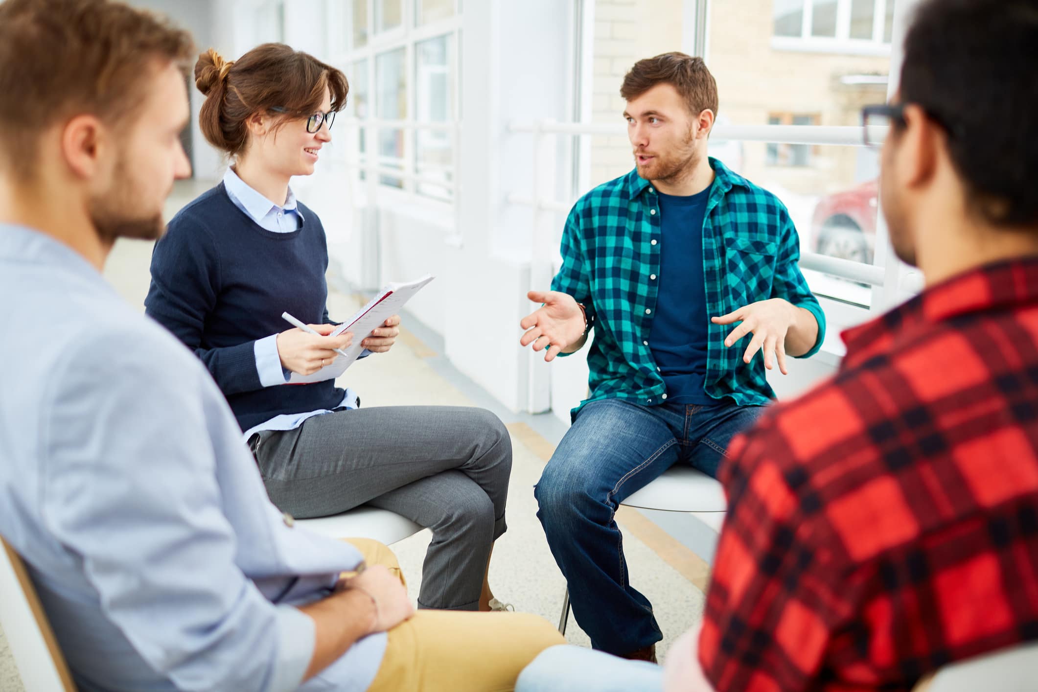  therapy group for anxiety sitting around each other 