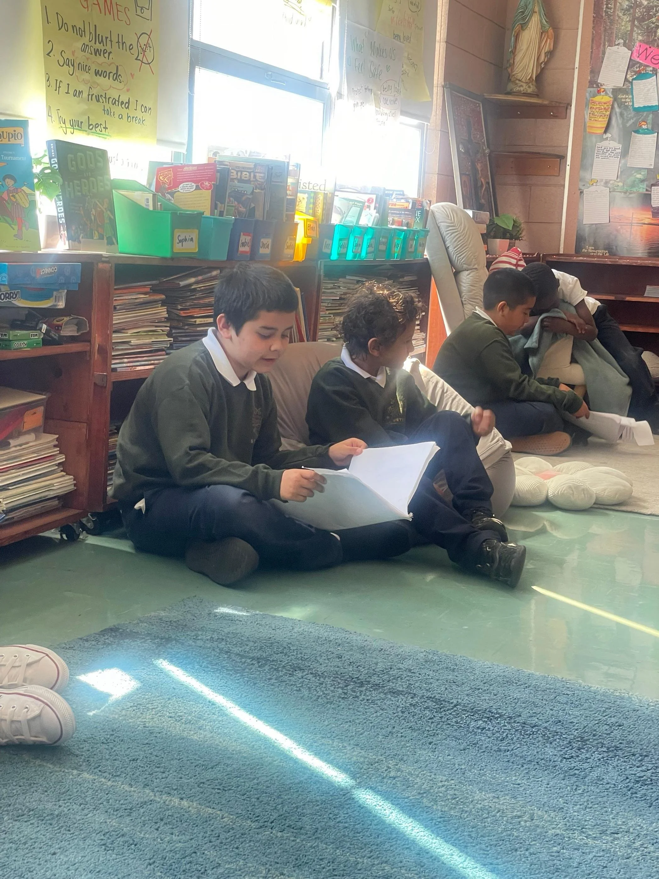 St. Peter’s students reading a book 