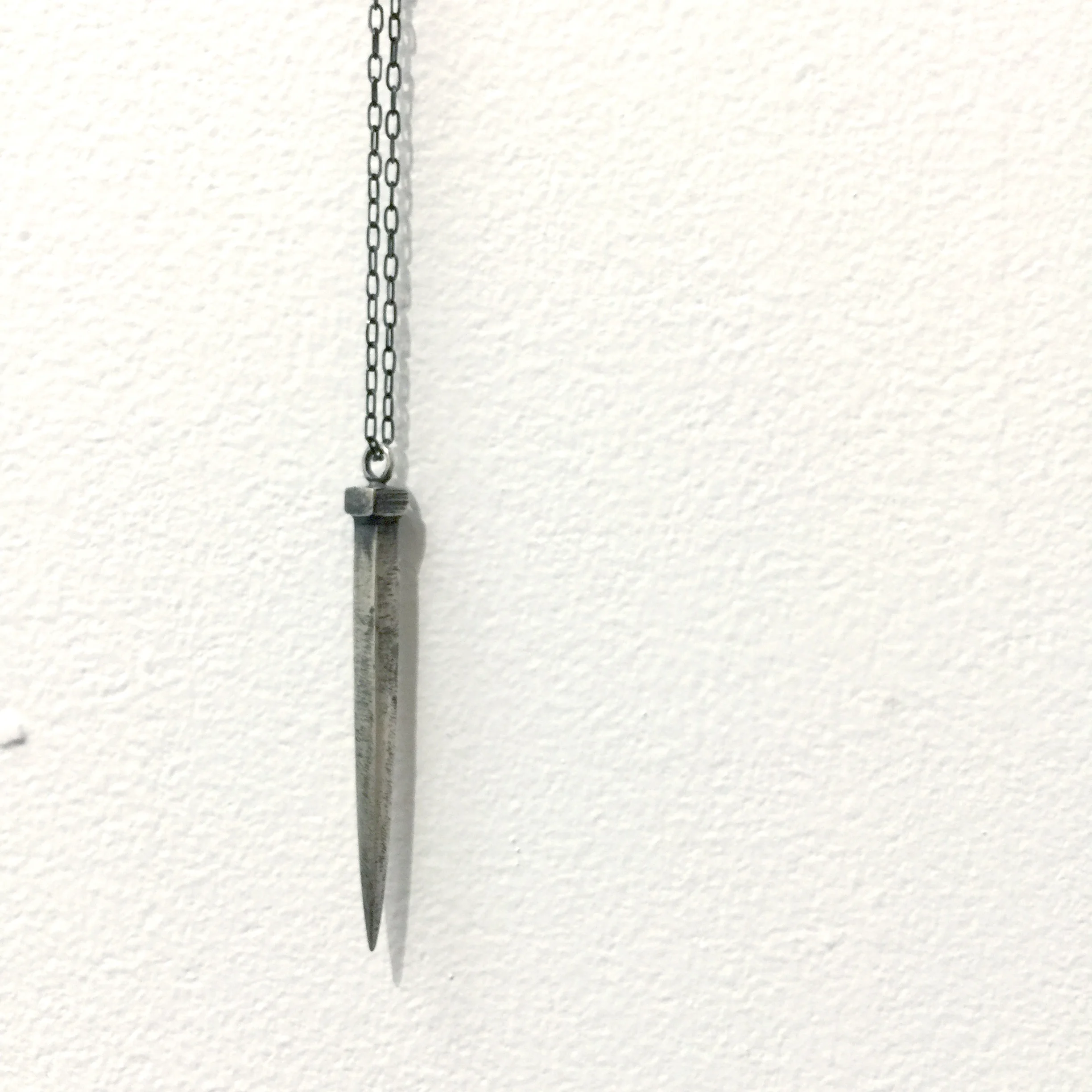 stephanie-kam-crucifixion-necklace-2.jpg