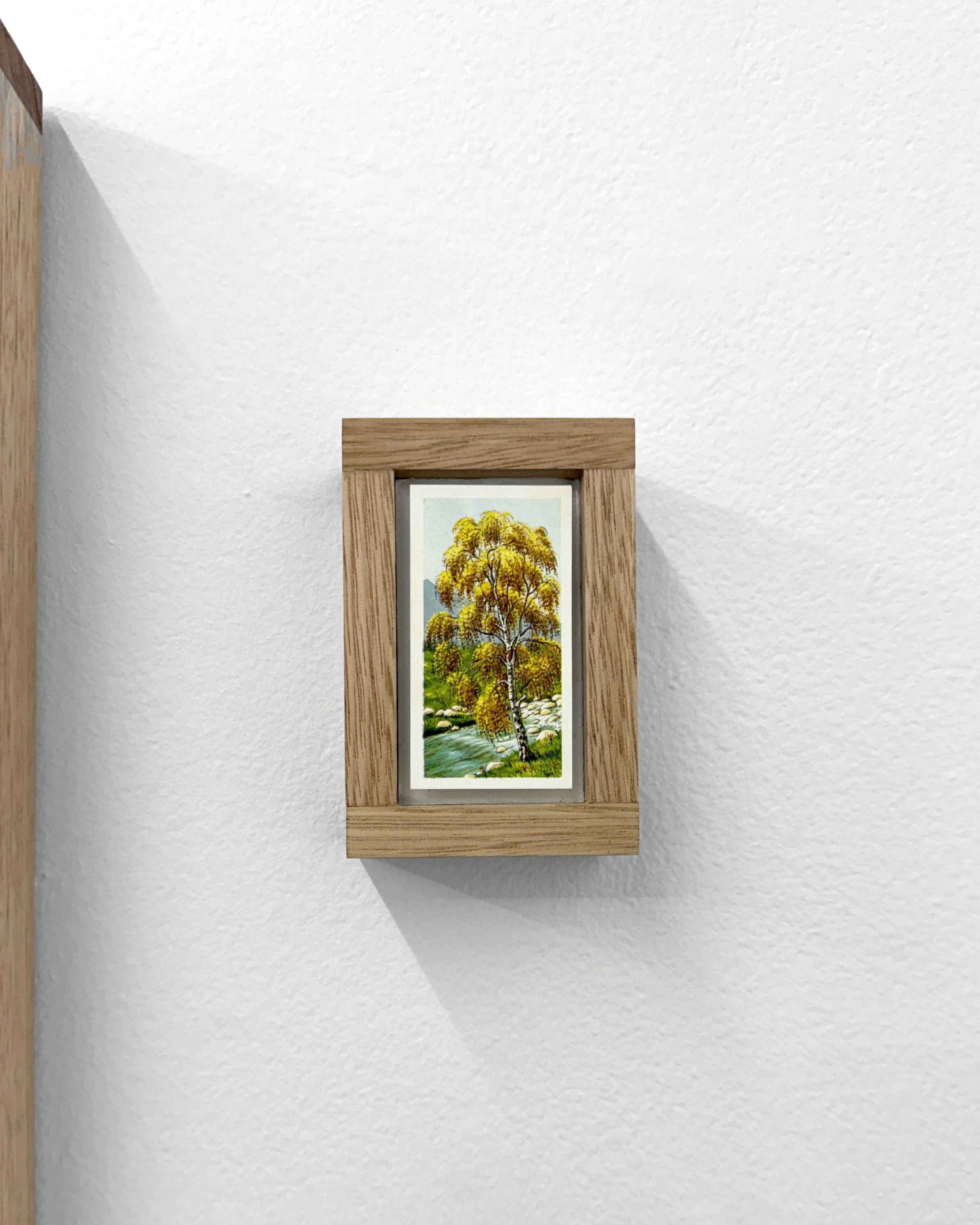  AMBER CRONIN  in the small hours of tomorrow (triptych), 2025  embroidery floss, cotton, Damask linen, tobacco collector card, oak. 43 x 65 x 4 cm 