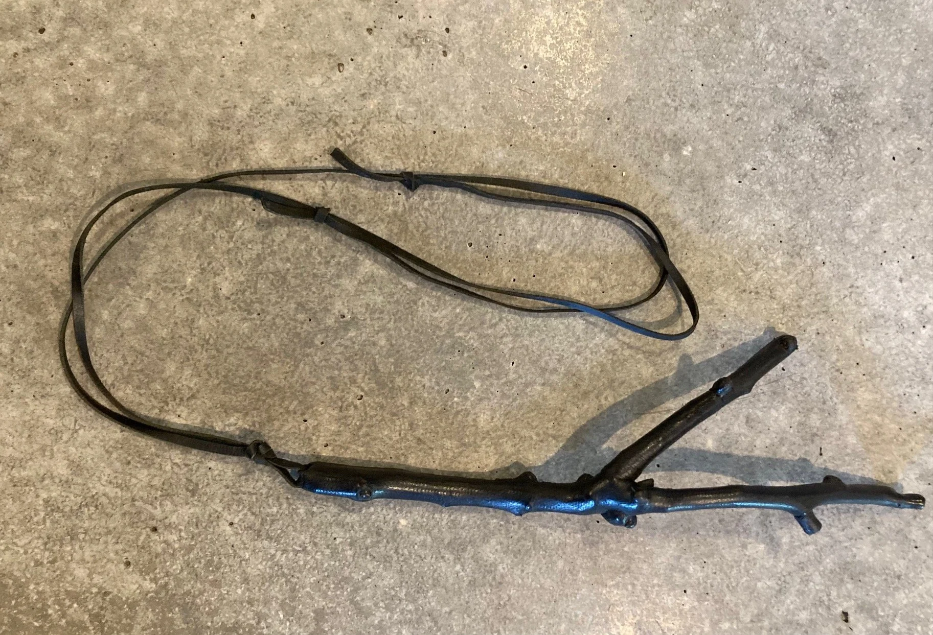 Magnolia branch leather shrouded neckpiece