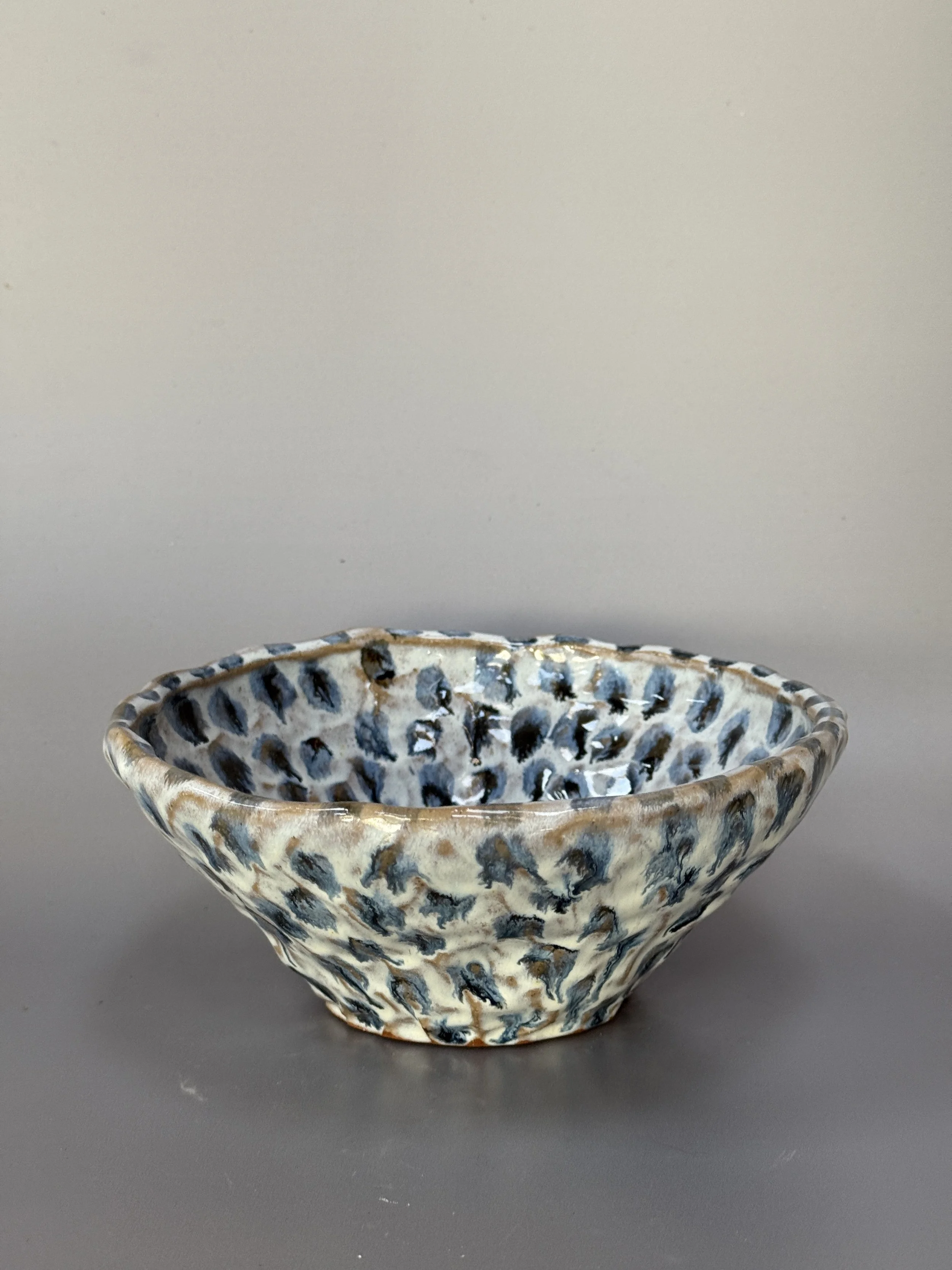Large pinched bowl (blue spots)