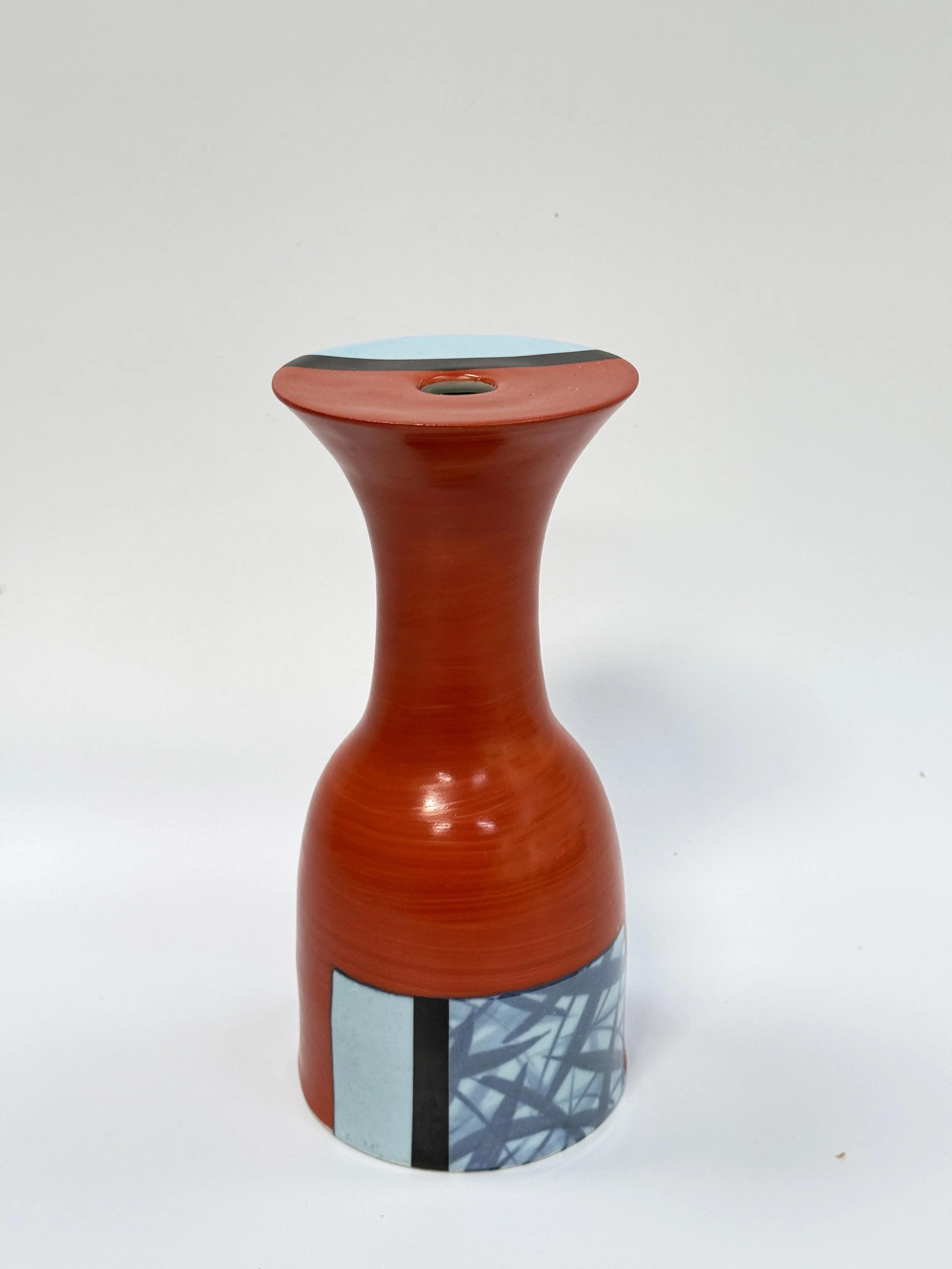 Vase for a self-isolating flower